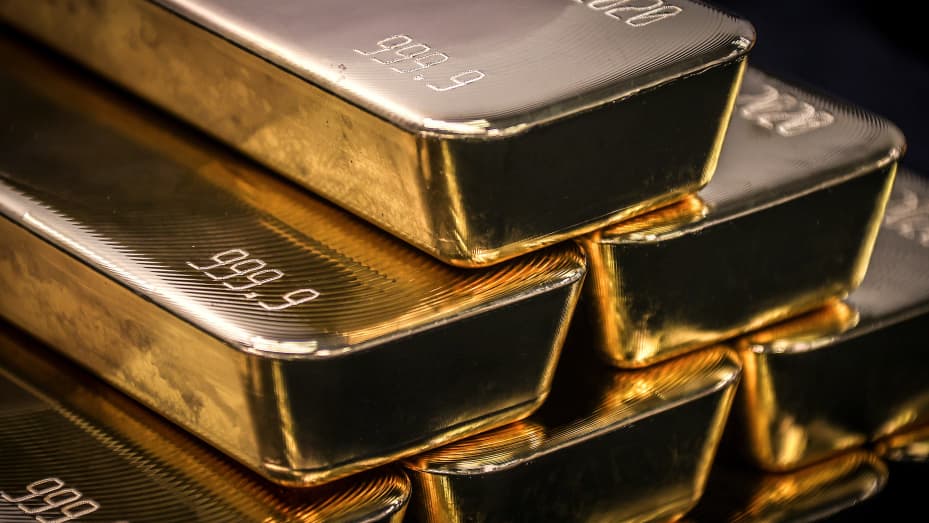 TOPSHOT - Gold bullion bars are pictured after being inspected and polished at the ABC Refinery in Sydney on August 5, 2020. - Gold prices hit 2,000 USD an ounce on markets for the first time on August 4, the latest surge in a commodity seen as a refuge a