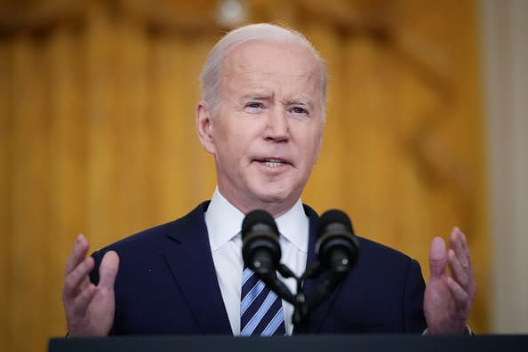 Biden vows wider sanctions on Russia in effort to cut Moscow off from the global economy