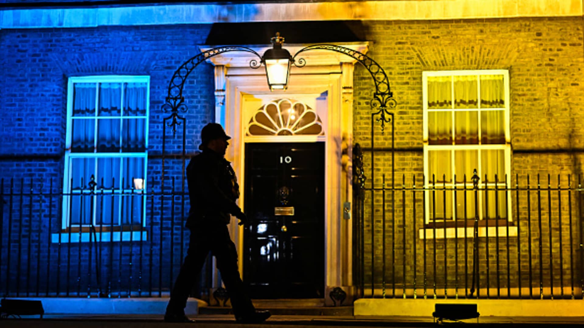 The front of 10 Downing Street, the residence of British Prime Minister Boris Johnson, is lit up blue and yellow in an expression of solidarity with Ukraine on February 24, 2022 in London, England.