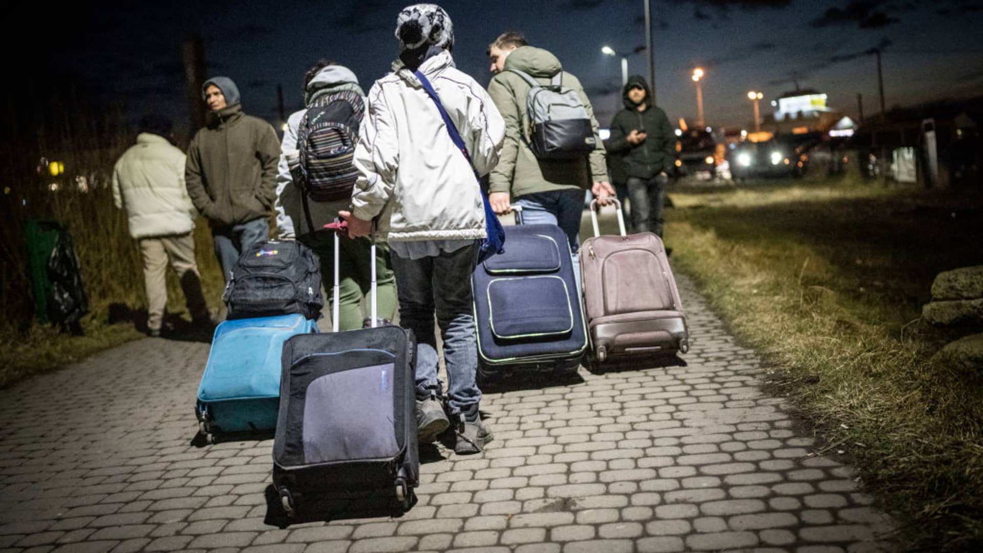 Refugees from Ukraine arrive in Medyka in Poland after crossing the border from Shehyni in Ukraine. Many people leave the country after Russia's attack on Ukraine.