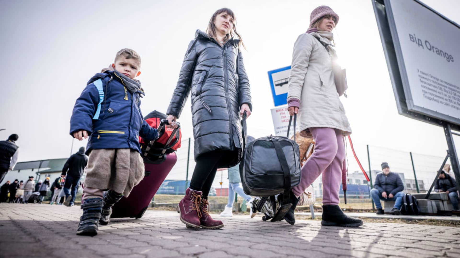 Refugees from Ukraine go from Shehyni in Ukraine to Medyka in Poland after crossing the border. Many Ukrainians leave the country after military actions by Russia on Ukrainian territory.