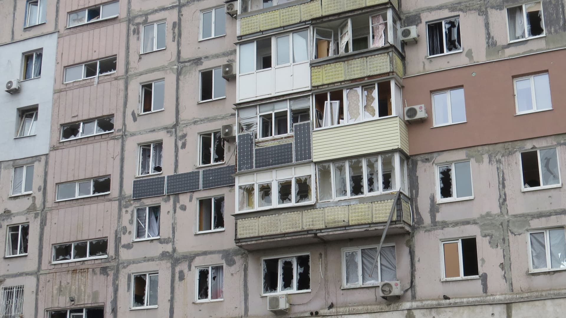 A view shows a residential building, which locals said was damaged by recent shelling, in Mariupol, Ukraine February 26, 2022.