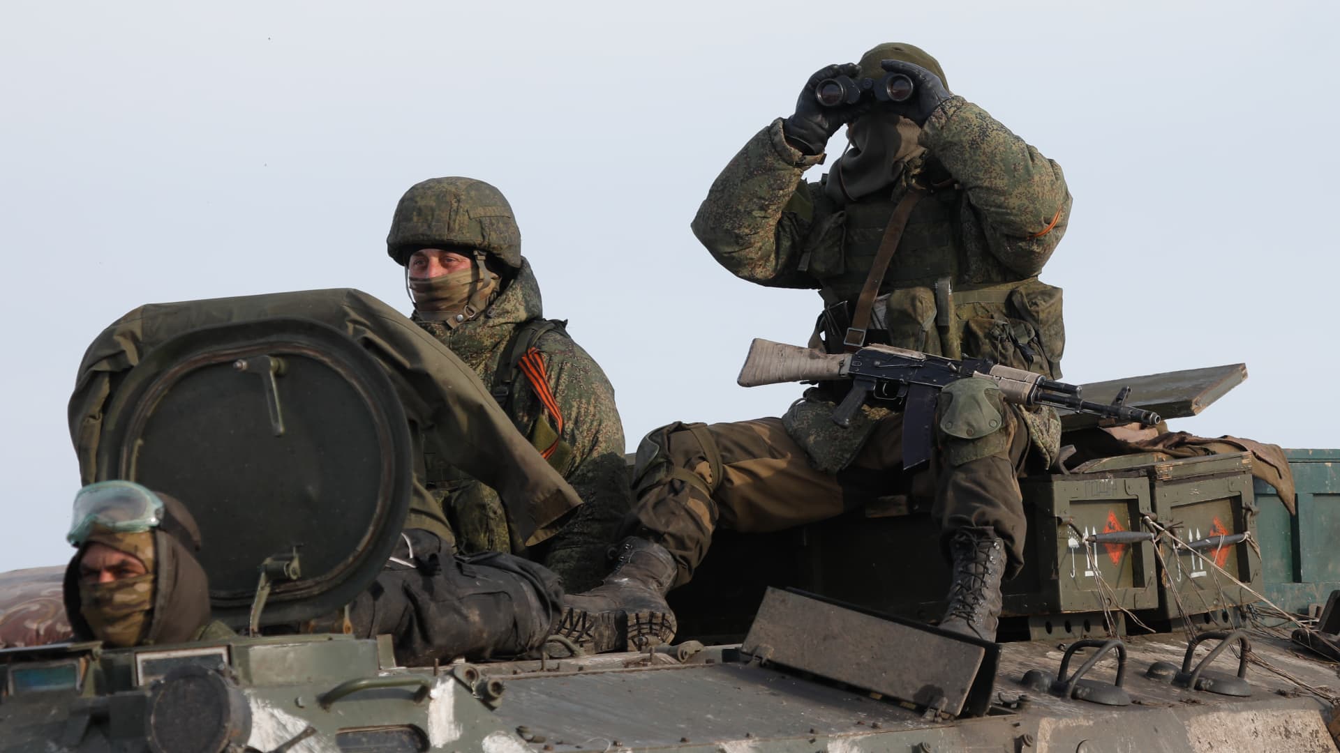 Servicemen are seen near the village of Oktyabrsky, Belgorod Region, near the Russian-Ukrainian border.