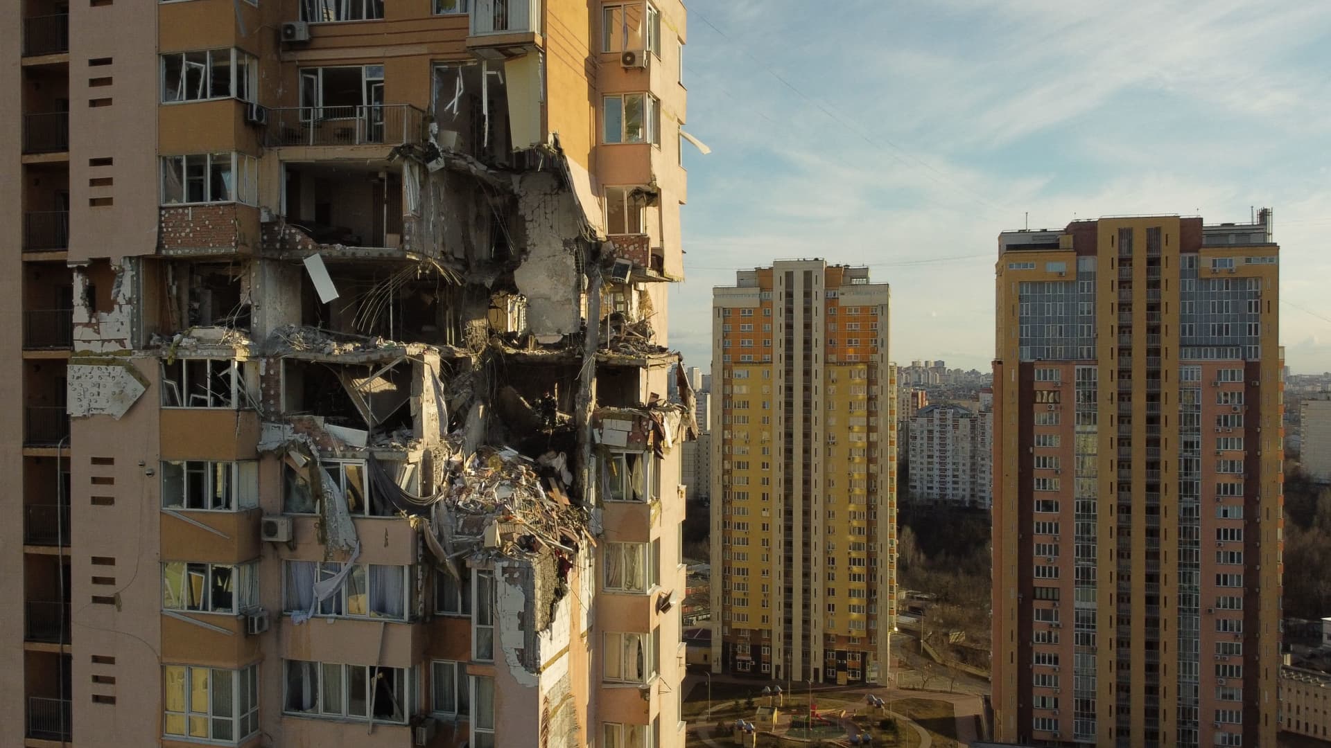This general view shows damage to the upper floors of a building in Kyiv on February 26, 2022, after it was reportedly struck by a Russian rocket.