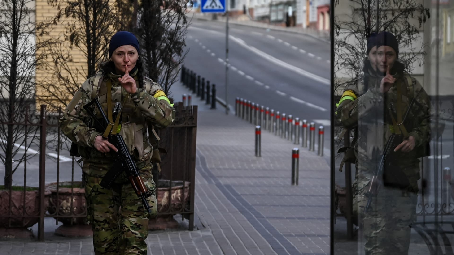 A member of Ukrainian forces patrols the streets at Maidan square in Kyiv, on February 27, 2022.