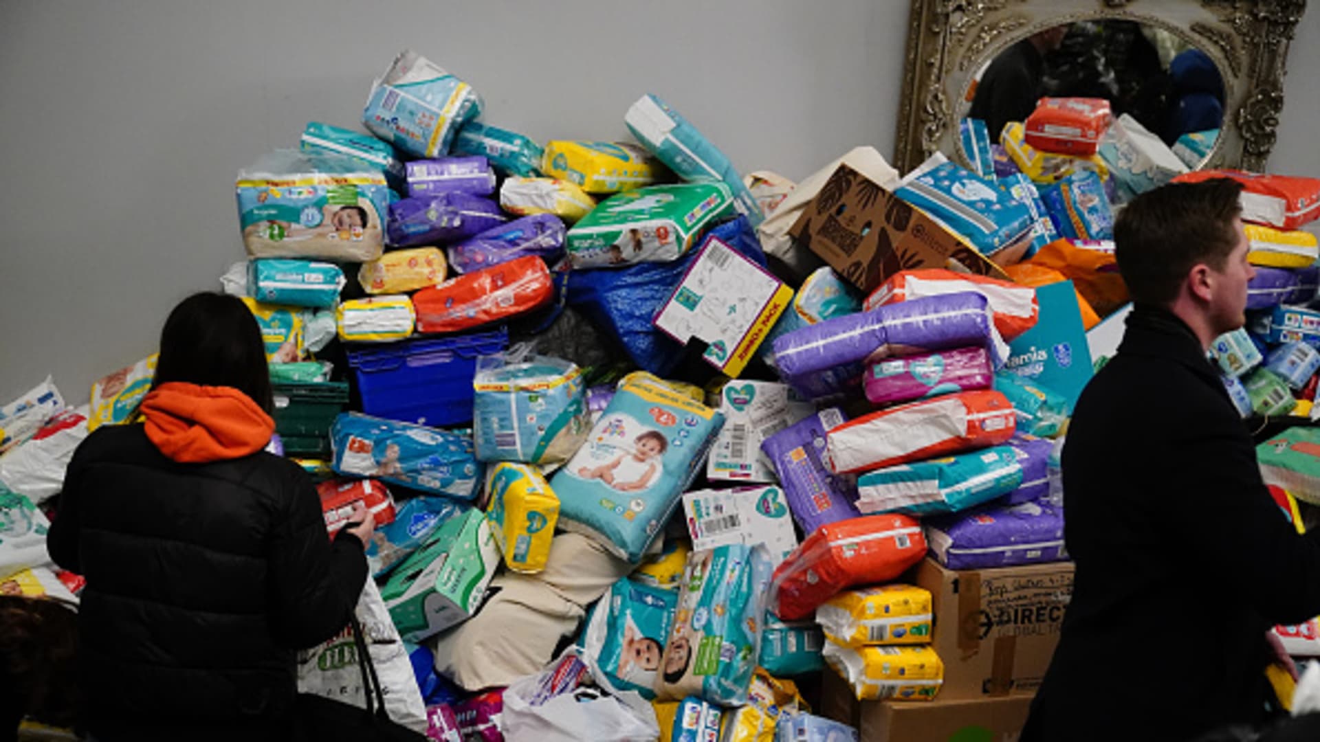 A large pile of nappies donated as aid for Ukrainian refugees at the Klub Orla Bialegoin Balham, south London, where it will be sorted before delivery overseas to those fleeing Ukraine following the Russian invasion.