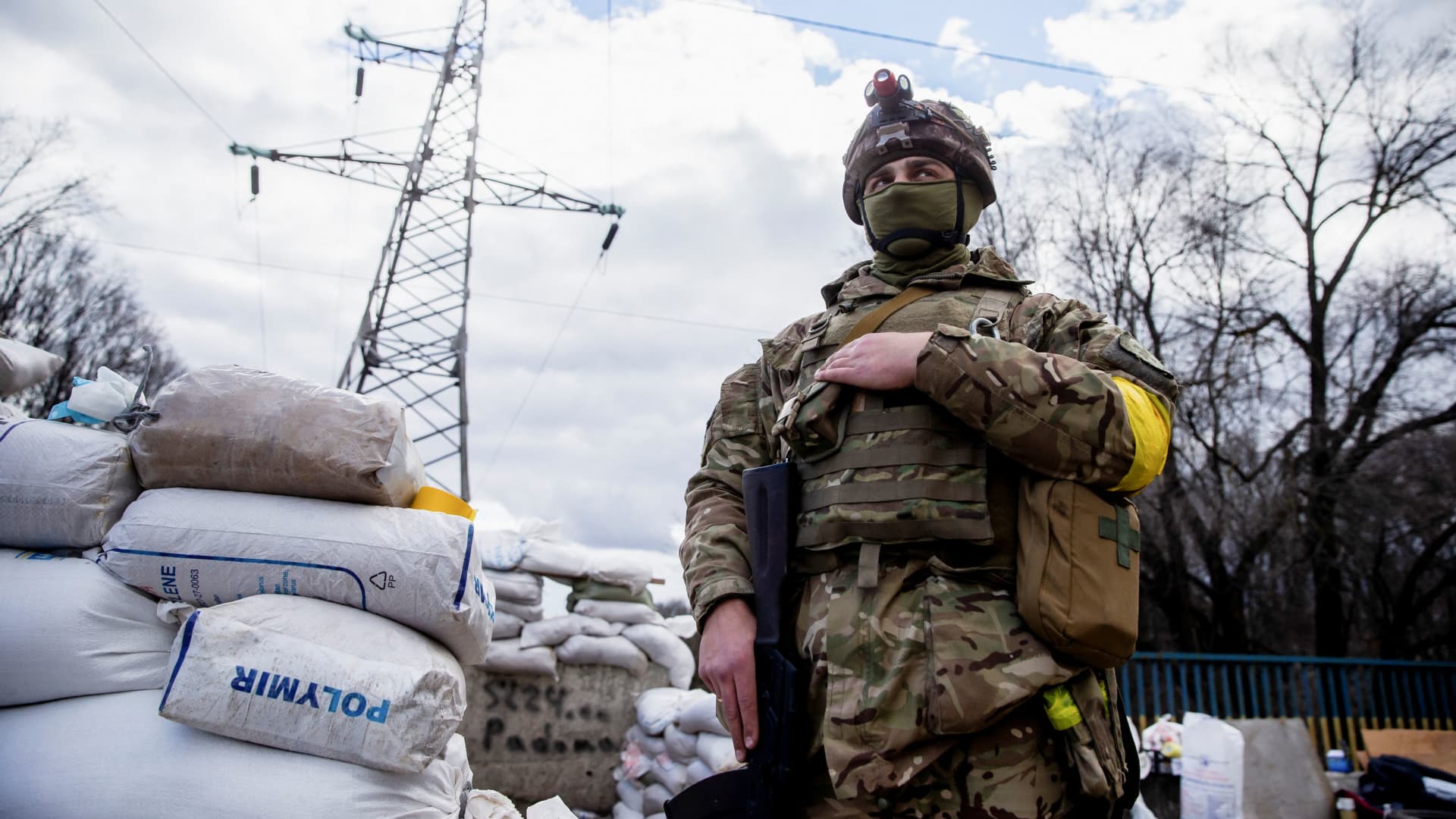 A Ukrainian service member is seen, after Russia launched a massive military operation against Ukraine, at a check point in the city of Zhytomyr, Ukraine February 27, 2022.