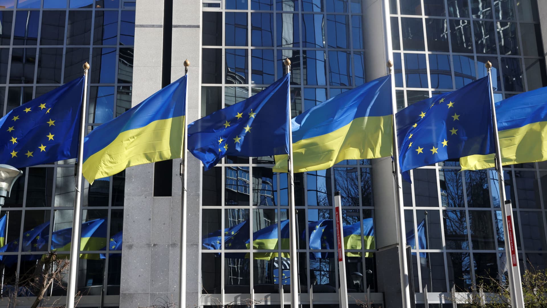 Flags of European Union and Ukraine flutter outside EU Parliament building, in Brussels, Belgium, February 28, 2022.