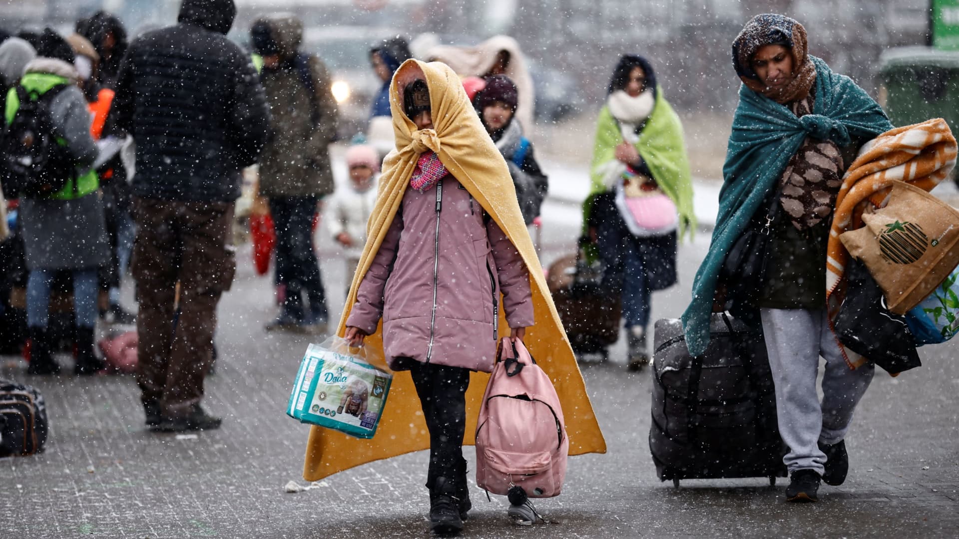 People fleeing Russian invasion of Ukraine arrive at a temporary camp in Przemysl, Poland, February 28, 2022. i