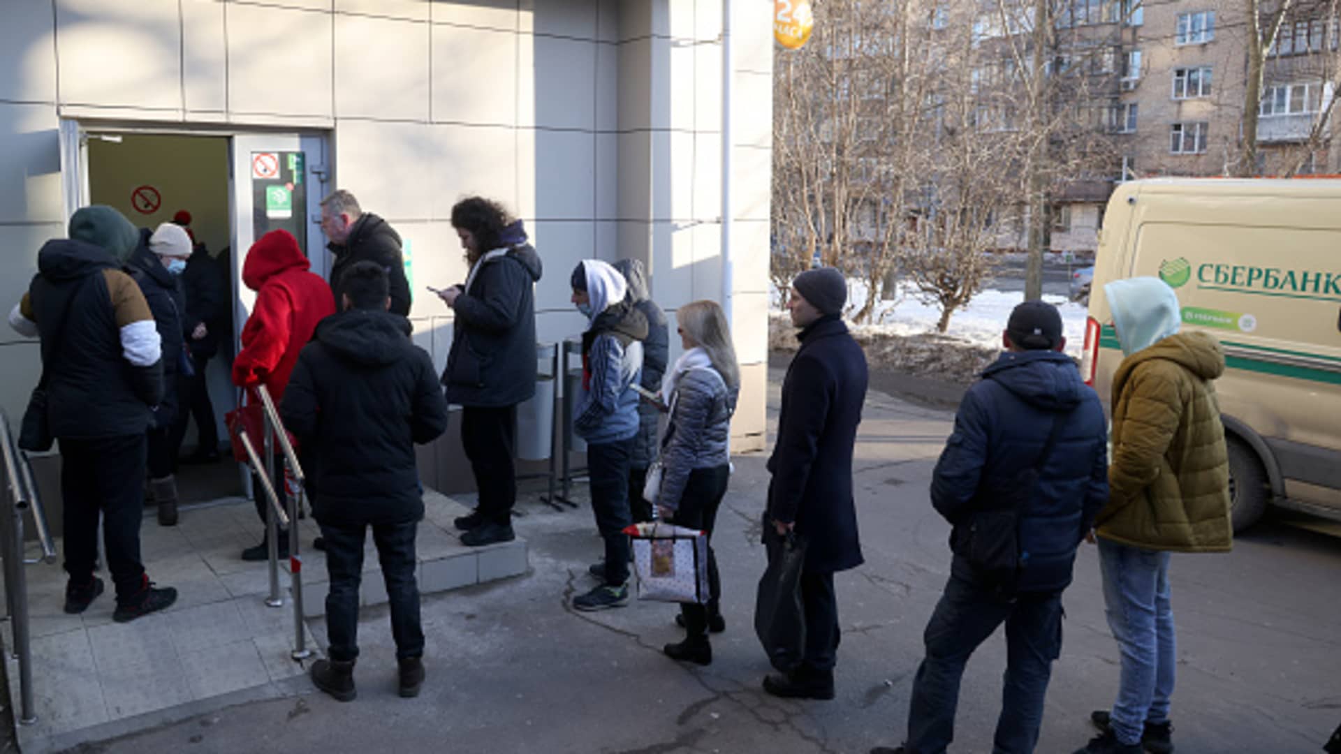 People queue at a Sberbank branch. On 24 February, the United States announced it was imposing sanctions on major Russian banks, including Sberbank and VTB in response to the special military operation in Ukraine.