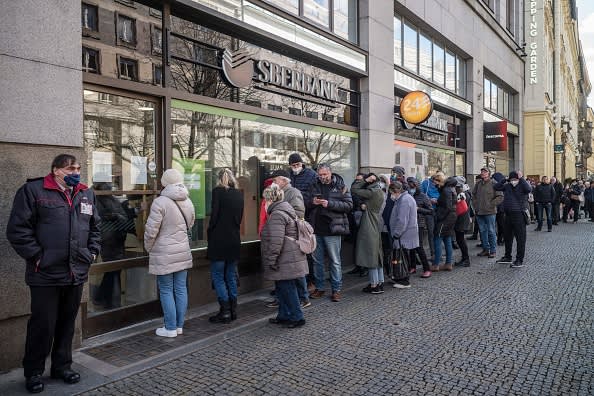 Long lines at Russia's ATMs as bank run begins — with more pain to come