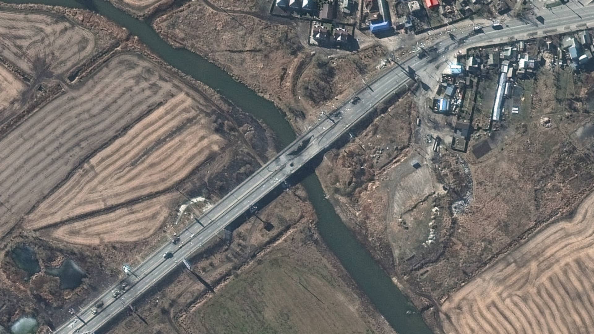 Maxar satellite imagery of destroyed vehicles and bridge damage in Irpin, Ukraine - Northwest of Kyiv.