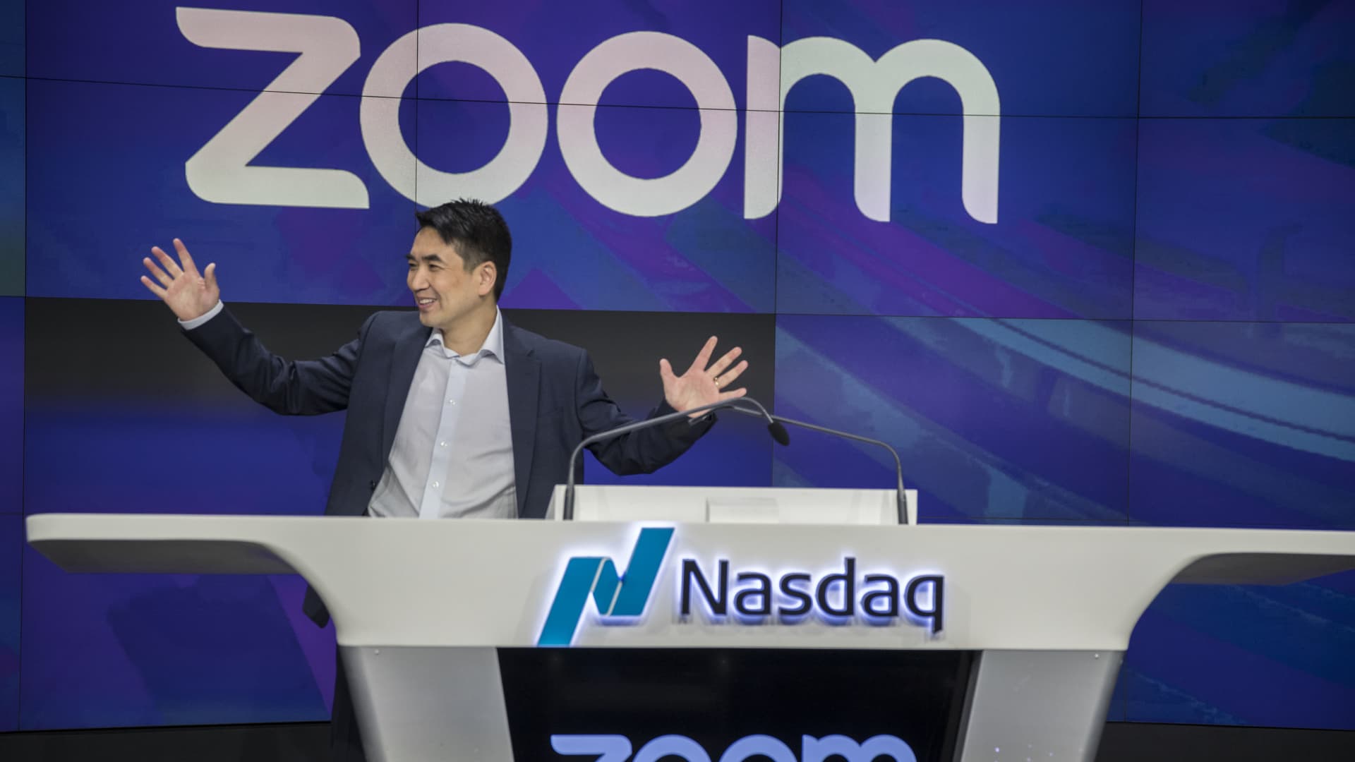 Eric Yuan, founder and CEO of Zoom Video Communications, stands before the opening bell during the company's initial public offering at the Nasdaq MarketSite in New York on April 18, 2019.