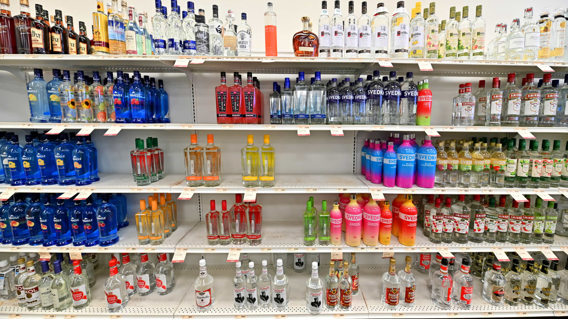 Empty spaces in the shelves of a vodka section of a Pennsylvania liquor store after Russian labels were removed.