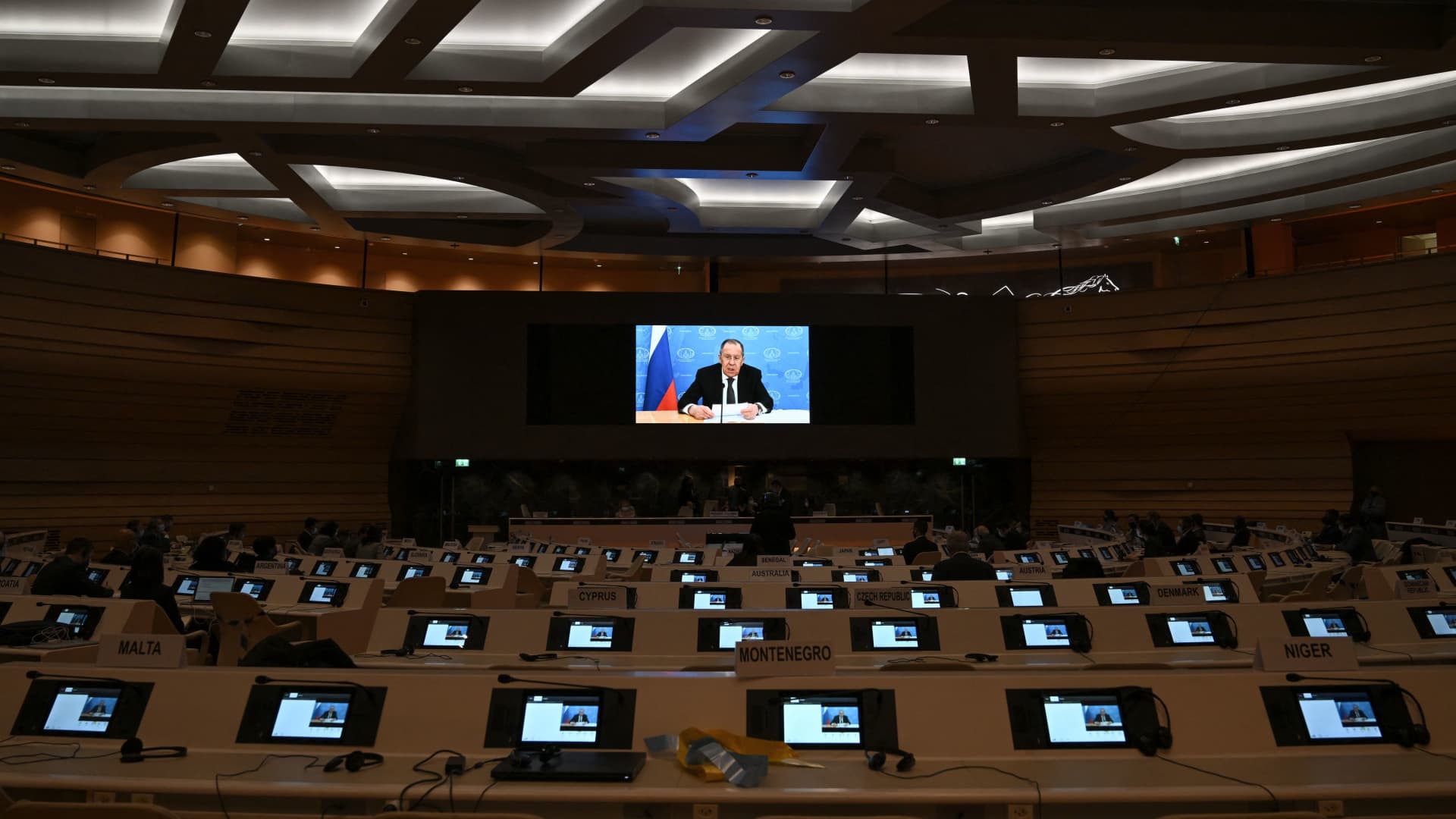 Geneva, March 1, 2022: Ambassadors and diplomats walk out of the U.N. Human Rights Council meeting as Russian Foreign Minister Sergei Lavrov's pre-recorded video message begins to play.