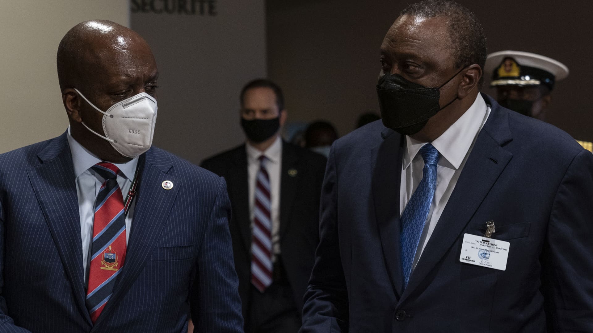 NEW YORK, Oct. 12, 2021: Permanent Representative of Kenya to the United Nations, Martin Kimani and Uhuru Muigai Kenyatta, President of Kenya walk in hallway after SC meeting at United Nations Headquarters.