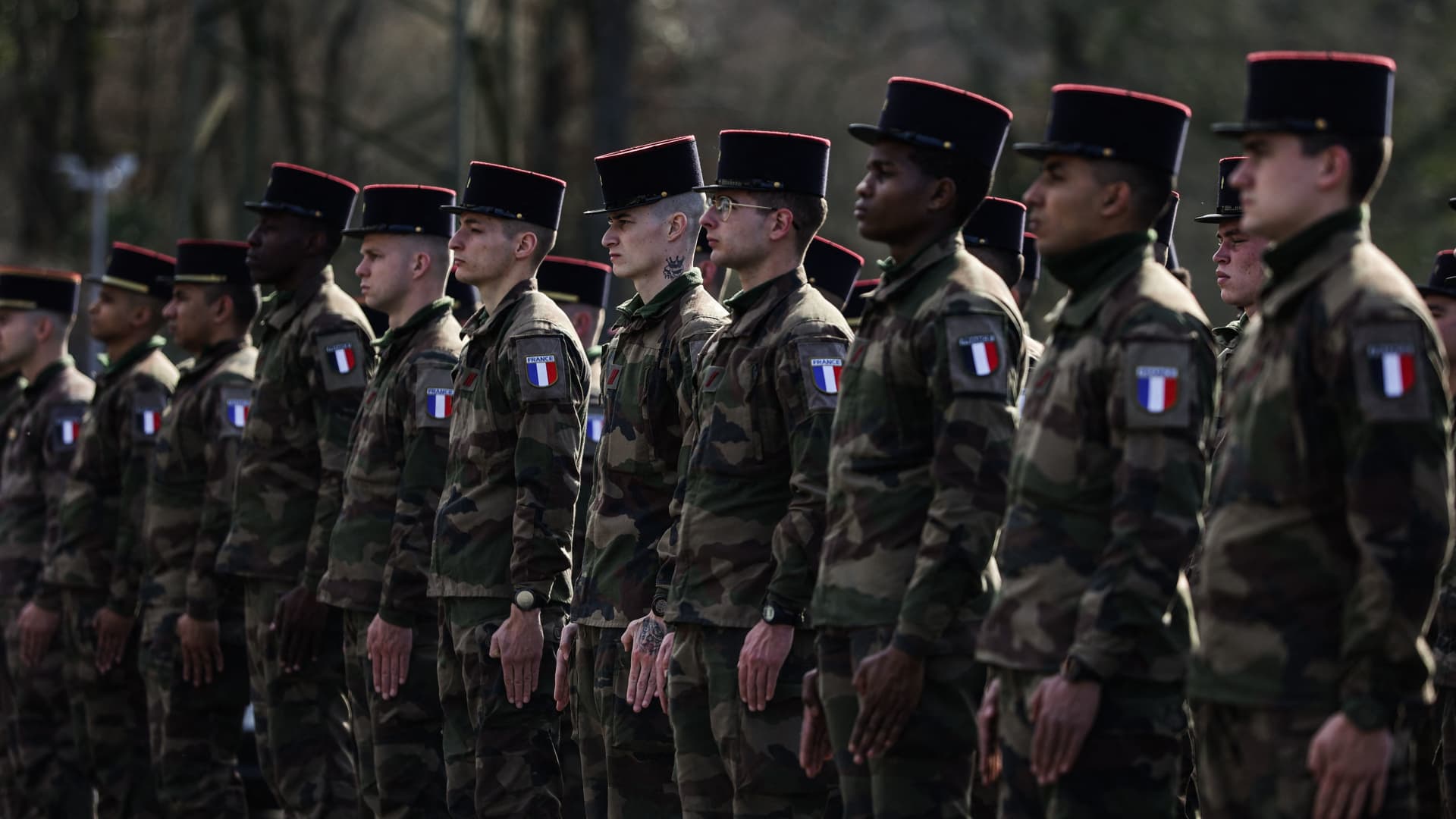 French soldiers of the Infantry Regimentstand in line as they prepare to leave for Romania, at the Caserne Brune et Laporte base in Brive-la-Gaillarde, central France, on March 1, 2022.