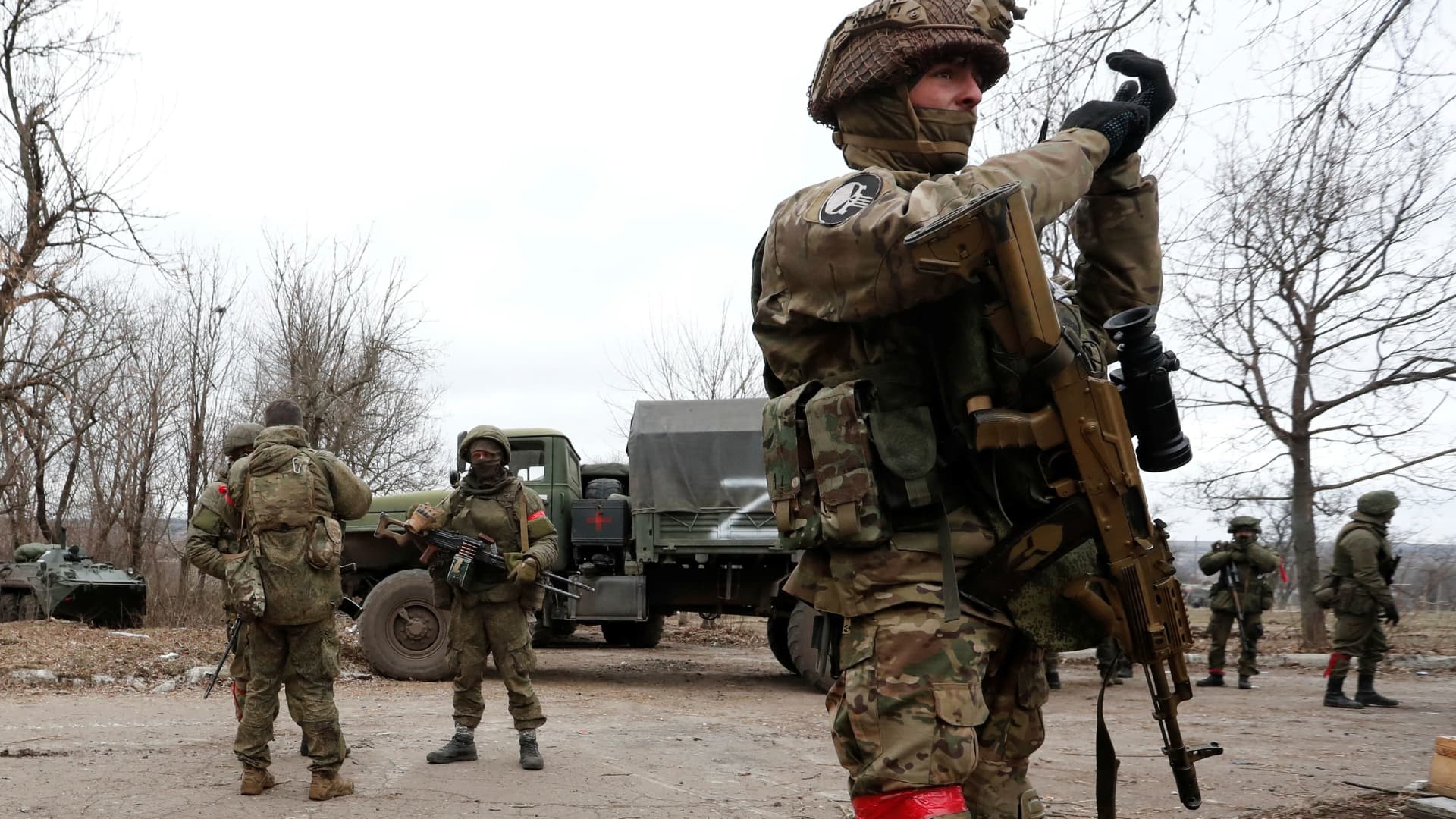 Service members of pro-Russian troops in uniforms without insignia gather in the separatist-controlled settlement of Mykolaivka (Nikolaevka), as Russia's invasion of Ukraine continues, in the Donetsk region, Ukraine March 1, 2022.