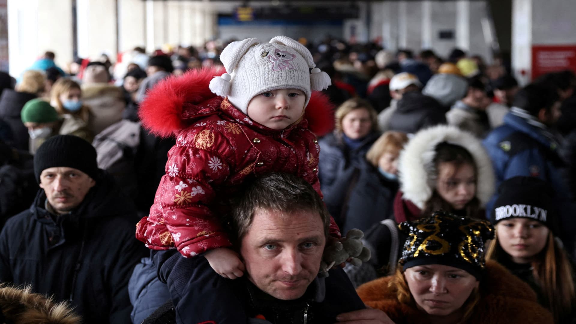 People wait to board an evacuation train from Kyiv to Lviv at Kyiv central train station following Russia's invasion of Ukraine, in Kyiv, Ukraine March 1, 2022.