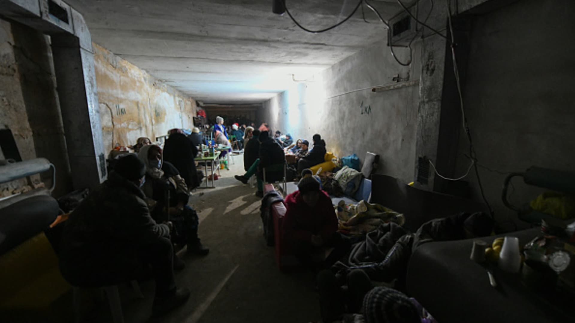 Residents stay in a bomb shelter after recent shellings in the separatist-controlled settlements in Mykolayivkaand Bugas in the Donetsk regionof Ukraine on March 01, 2022.