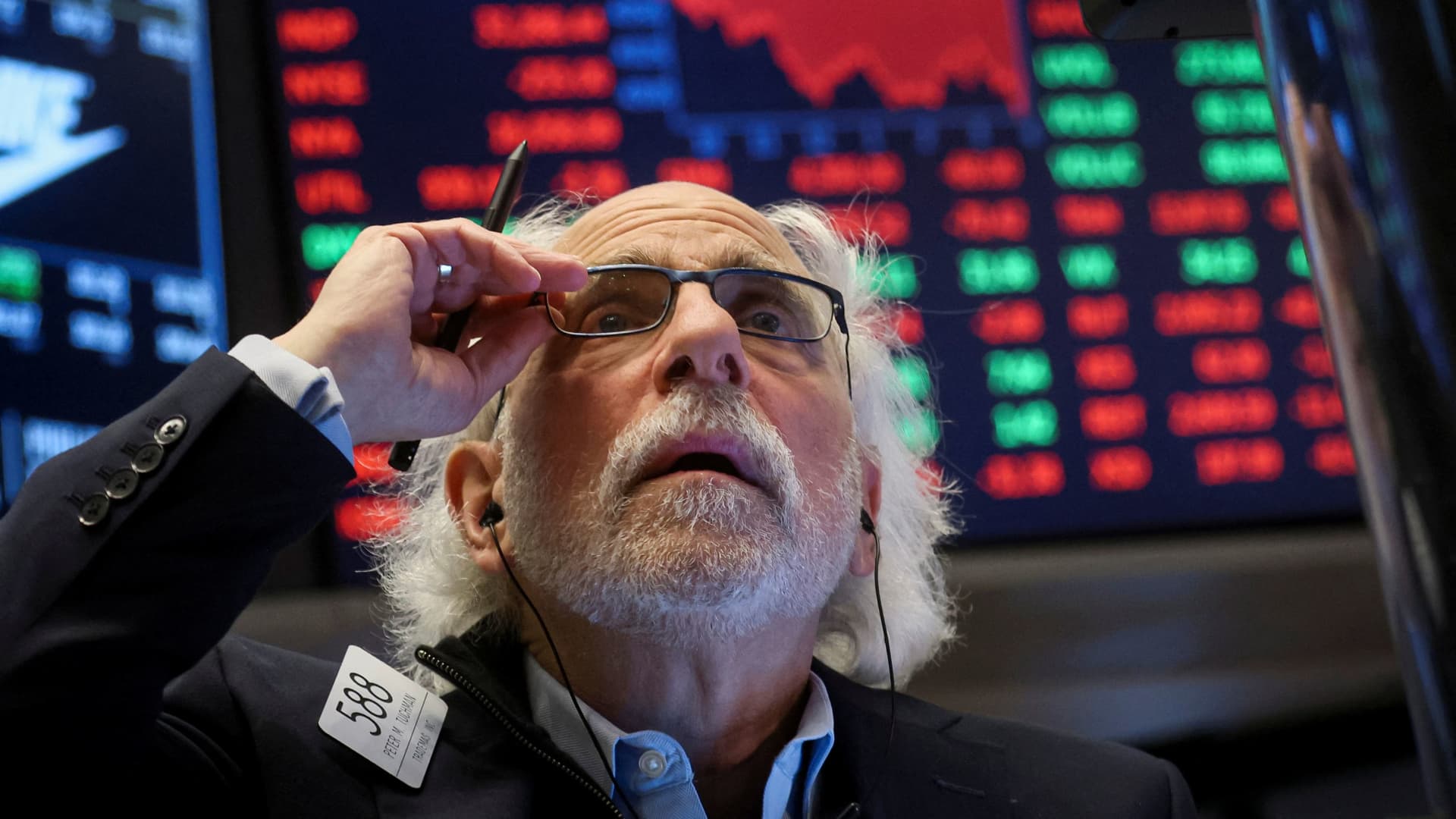 Trader Peter Tuchman works on the floor of the New York Stock Exchange (NYSE) in New York City, U.S., March 1, 2022.