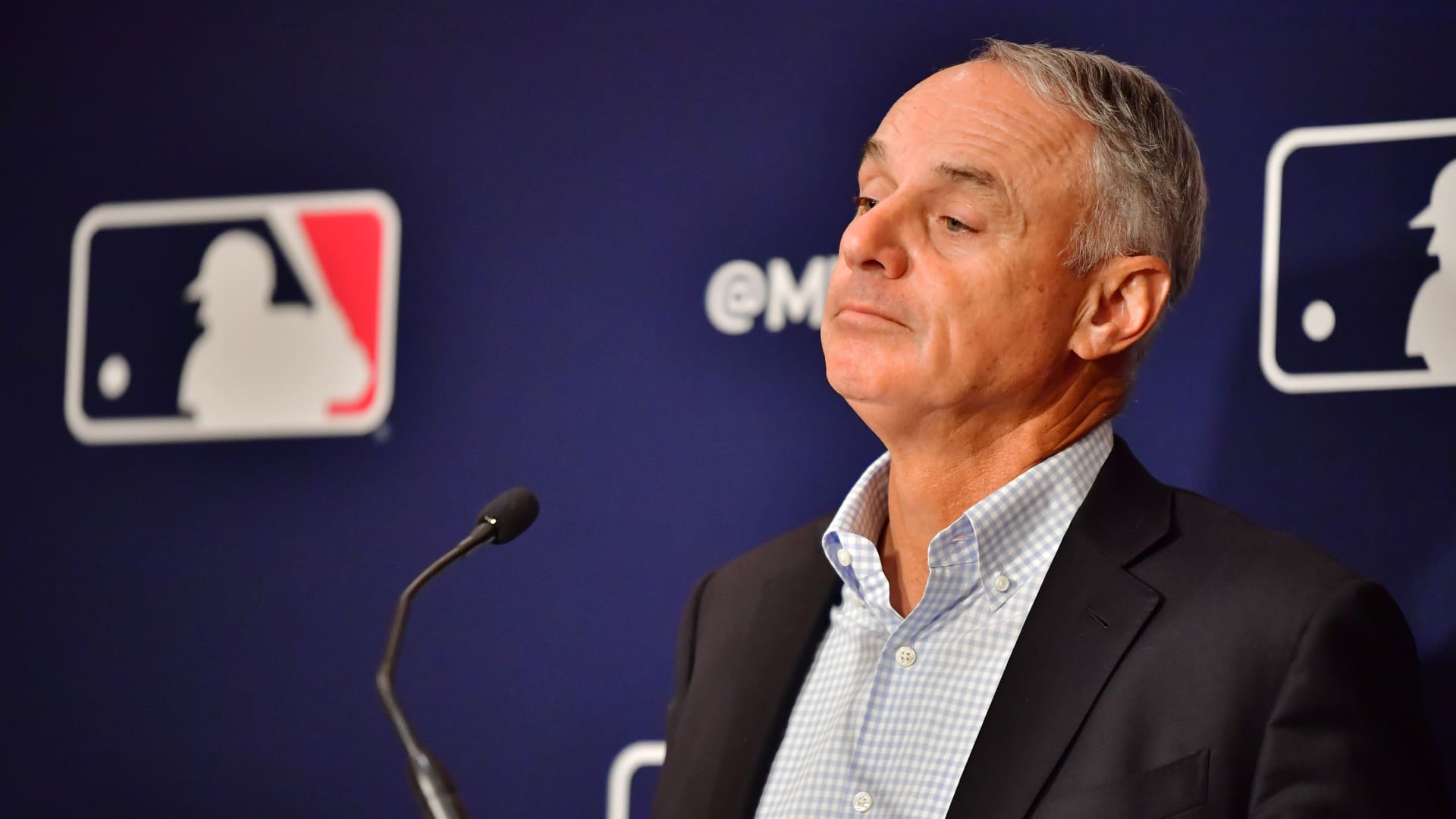 Major League Baseball Commissioner Rob Manfred answers questions during an MLB owner's meeting at the Waldorf Astoria on February 10, 2022 in Orlando, Florida. Manfred addressed the ongoing lockout of players, which owners put in place after the league's collective bargaining agreement ended on December 1, 2021.