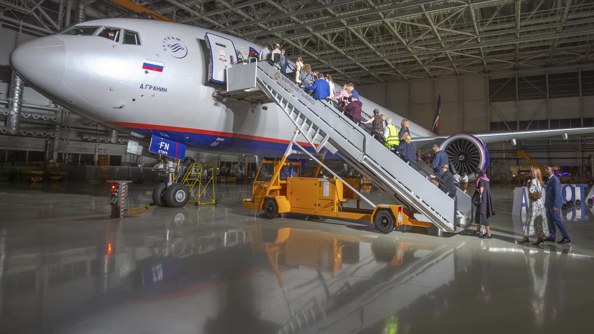 A presentation event takes place at Sheremetyevo International Airport for Aeroflot's Boeing 777-300ER airliner featuring a revamped cabin and individual business class seating. Marina Lystseva/TASS