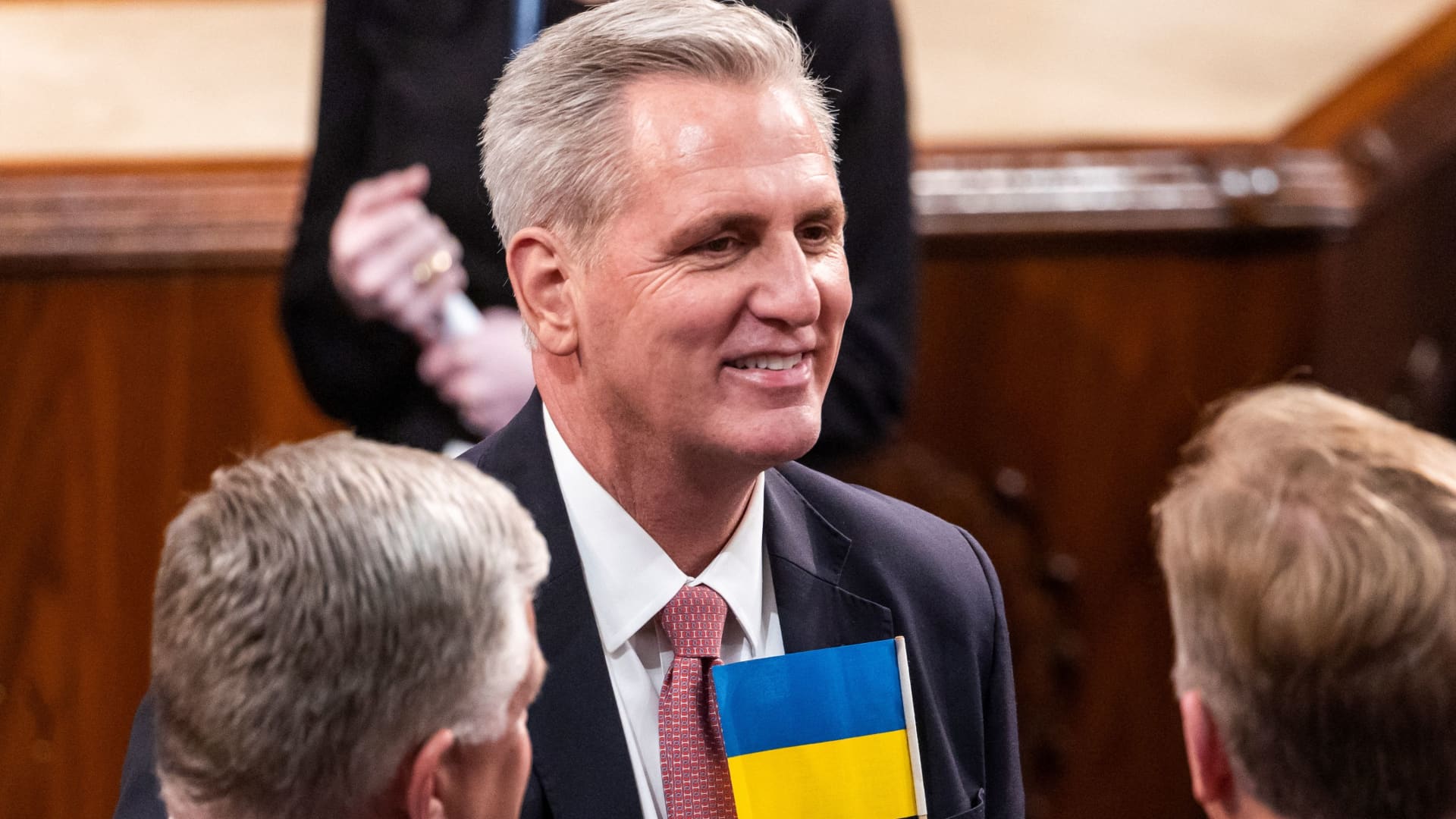 Republican House Minority Leader Kevin McCarthy (R-CA) wears a Ukrainian flag to US President Joe Biden's State of the Union Address in the US Capitol in Washington, DC, U.S., March 1, 2022. Jim Lo Scalzo/Pool via REUTERS