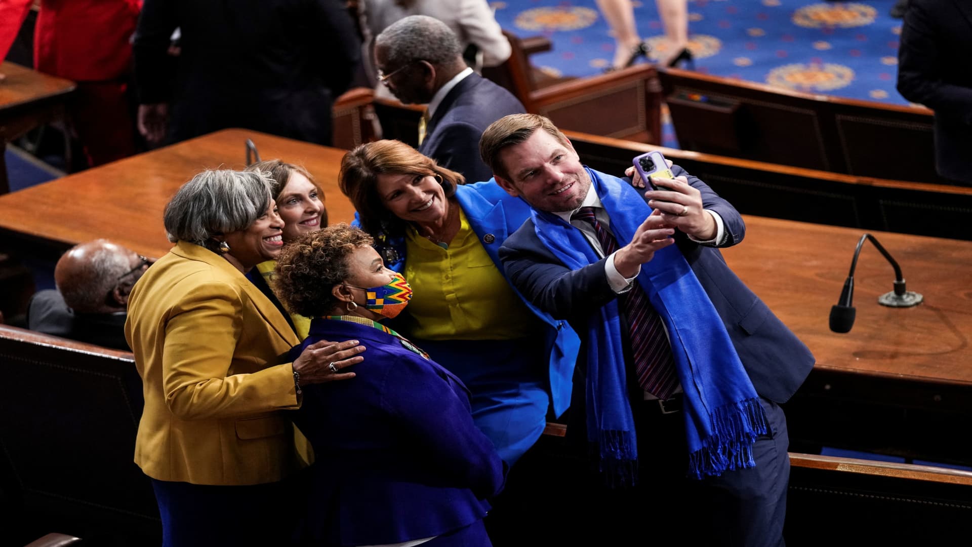 Democratic Representatives take a selfie ahead of U.S. President Joe Biden's State of the Union address during a joint session of Congress in the U.S. Capitol's House Chamber March 1, 2022 in Washington, U.S.
