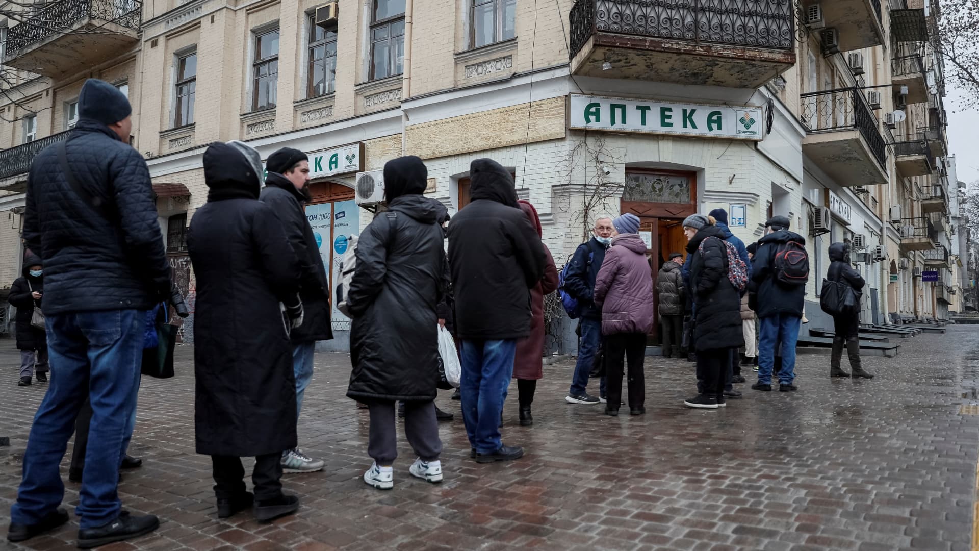 People line up in front of a pharmacy, as Russia's invasion of Ukraine continues, in central Kyiv, Ukraine March 2, 2022.