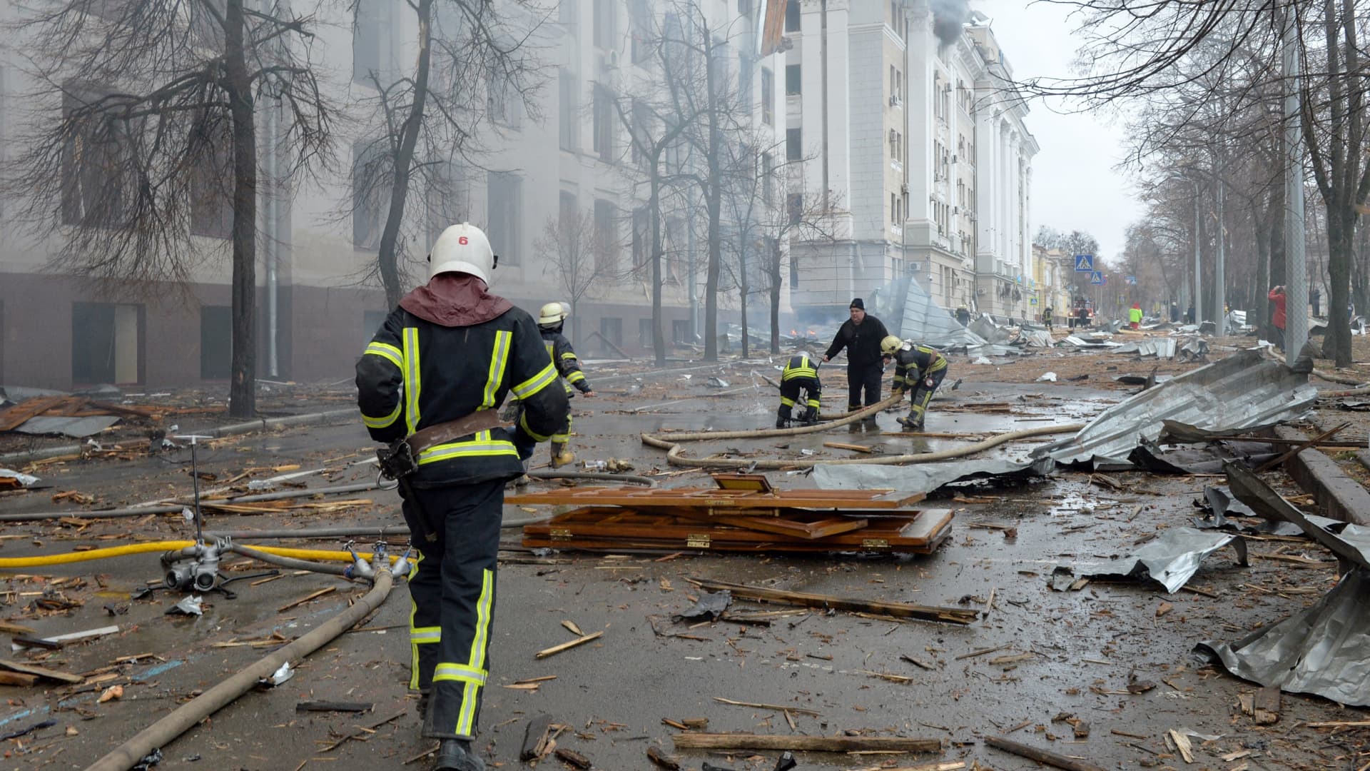 Firefighters work to contain a fire at the Economy Department building of Karazin Kharkiv National University, allegedly hit during recent shelling by Russia, in Kharkiv on March 2, 2022.
