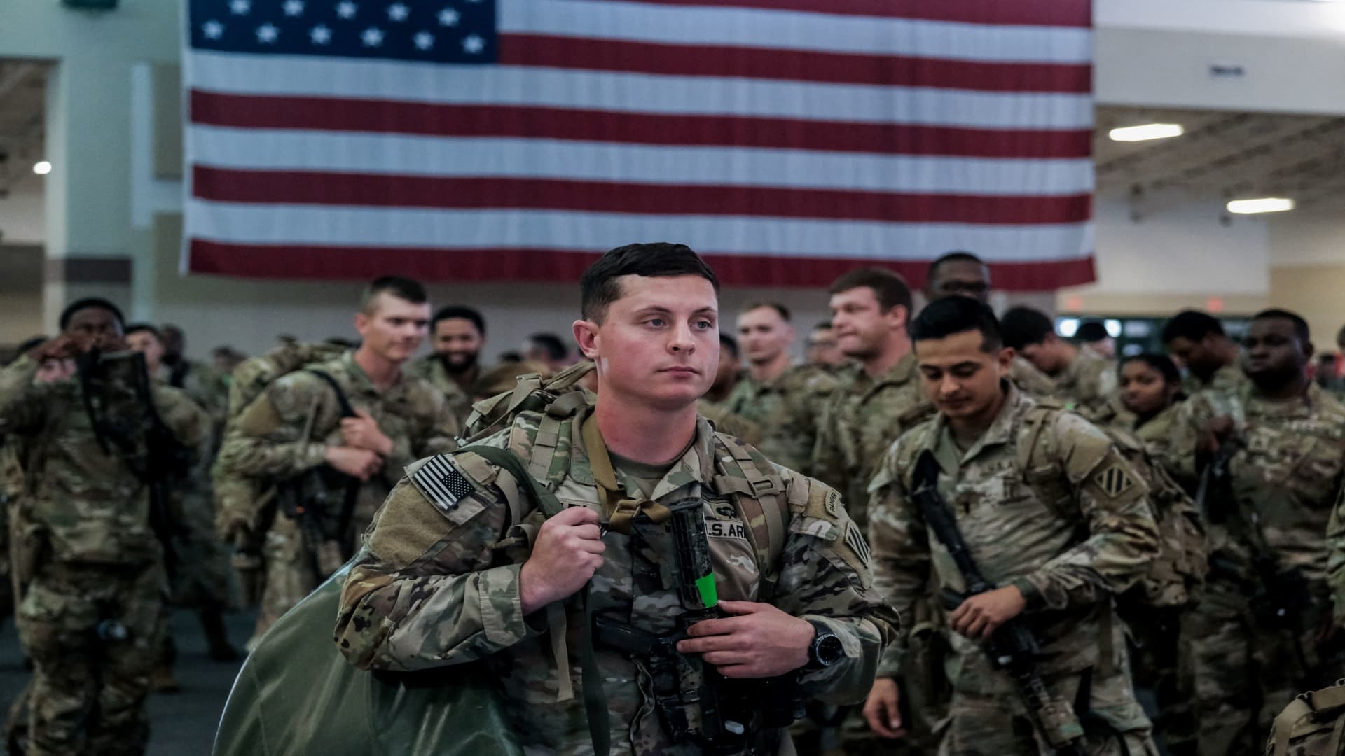 Soldiers from the U.S. Army’s 1st Armored Brigade Combat Team wait to board a transport plane bound for Europe on a deployment launched in response to the invasion of Ukraine by Russia, at Hunter Army Airfield, Georgia, U.S., March 2, 2022.