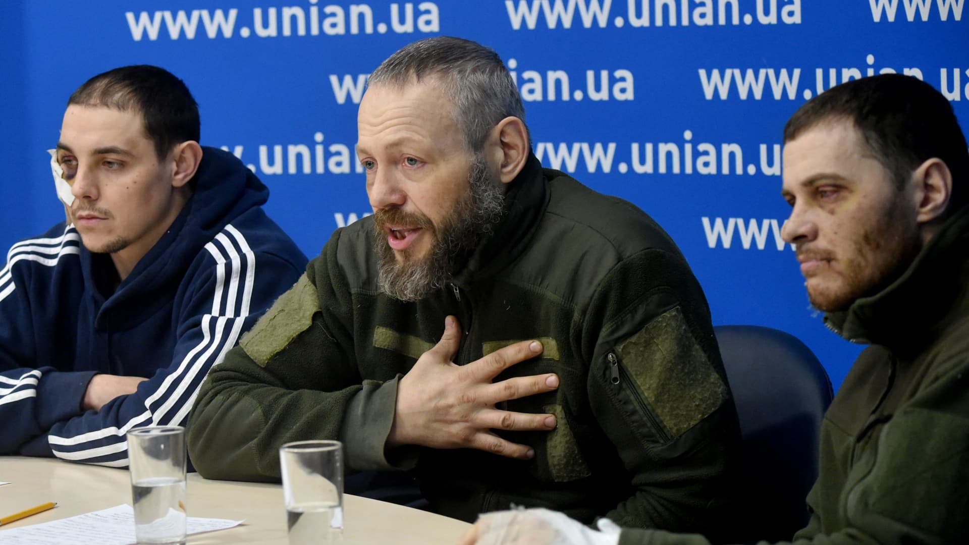 Russian prisoners of war, officers of the police sergeant Yevgeniy Plotnikov, lieutenant colonel Dmitriy Astakhov, and captain Yevgeniy Spiridonov are presented to the press in Ukrainian capital of Kyiv on March 2, 2022.