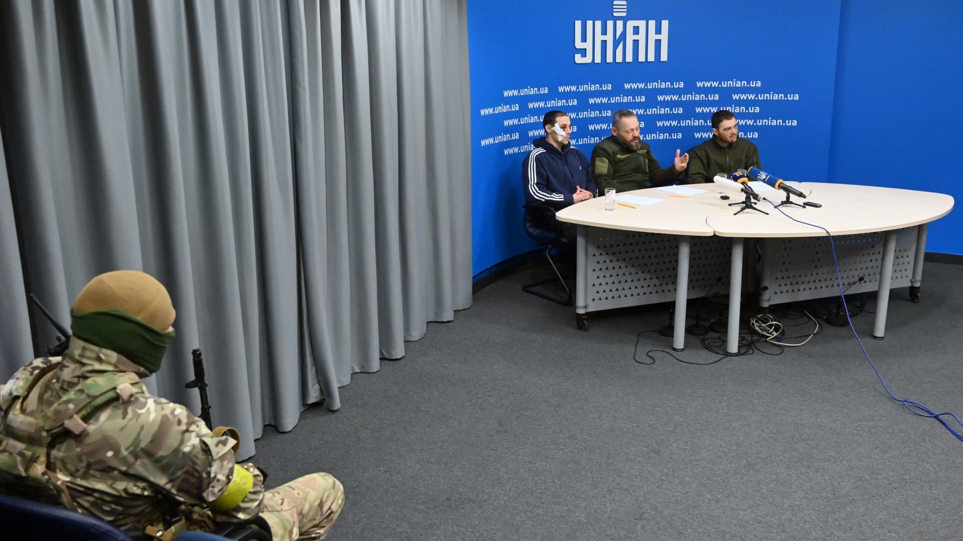 Russian prisoners of war, officers of the police sergeant Yevgeniy Plotnikov, lieutenant colonel Dmitriy Astakhov, and captain Yevgeniy Spiridonov are presented to the press in Ukrainian capital of Kyiv on March 2, 2022. 