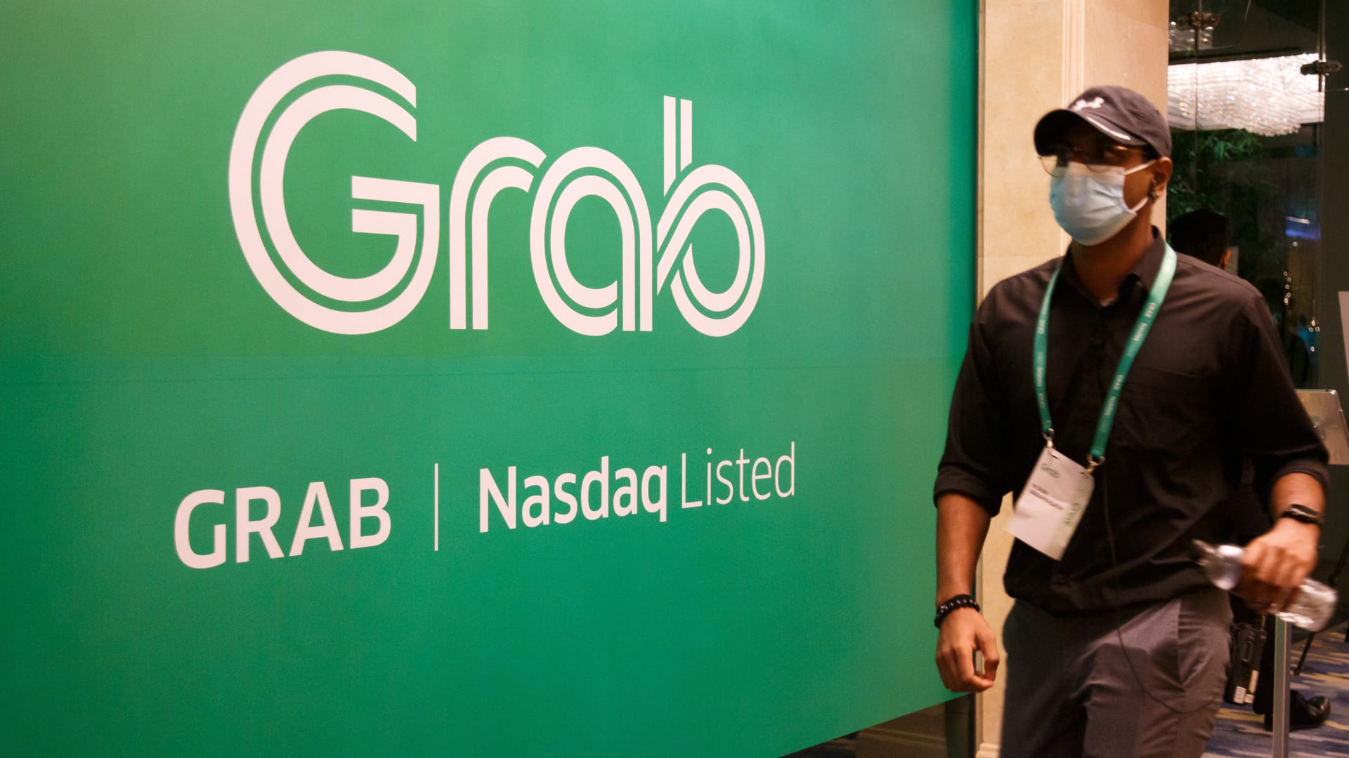 Ride-hailing giant Grab posts first profitable quarter, announces 0 million share buyback
