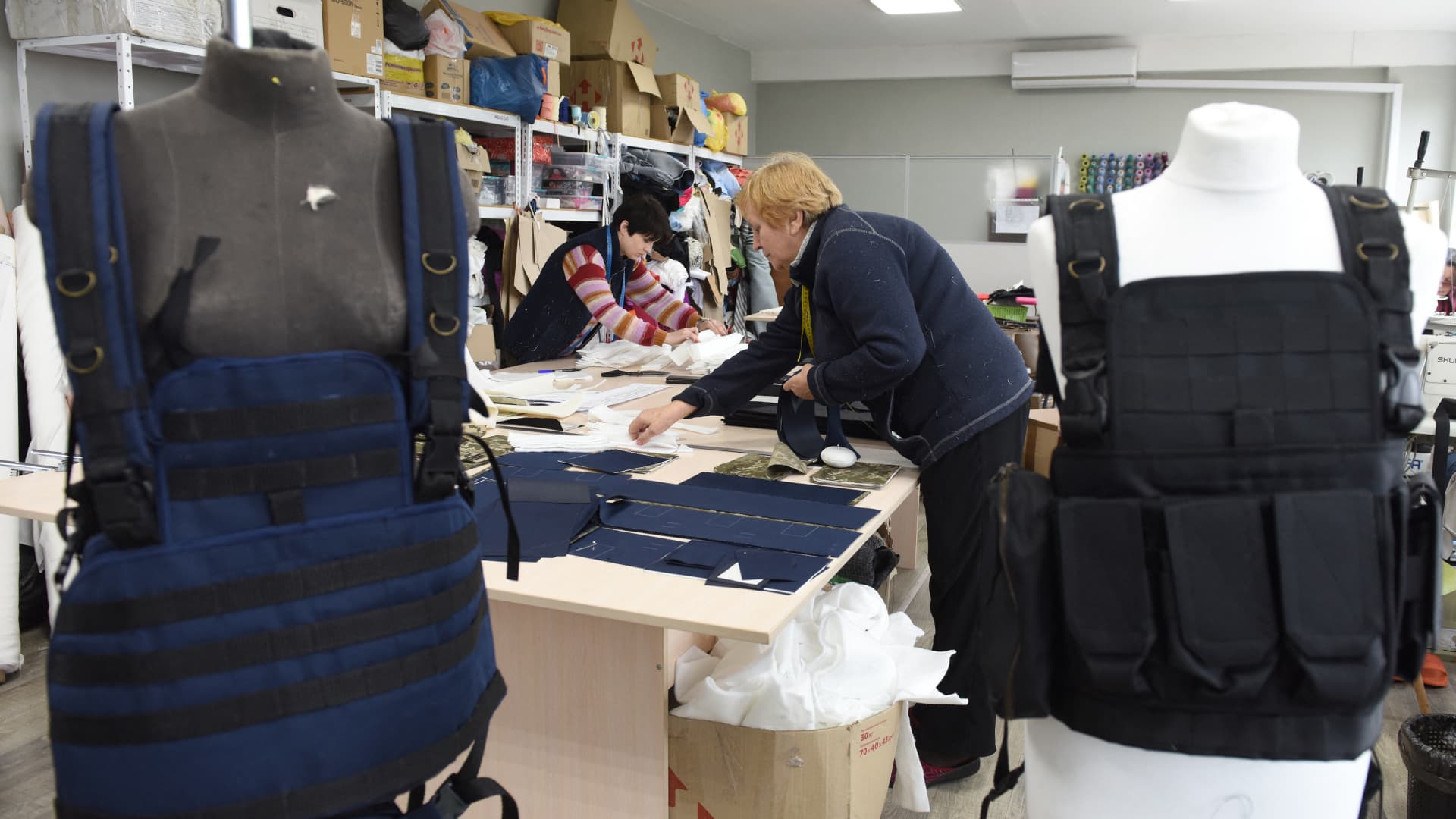 Volunteers sew tactical military vests for the Ukrainian army in the western Ukrainian city of Lviv on March 4, 2022.