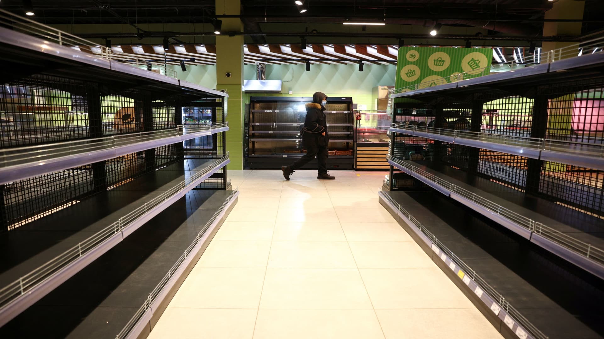 Shelves in a supermarket stand empty, following Russia's invasion of Ukraine, in Skvyra near Kyiv, Ukraine, March 4, 2022. 
