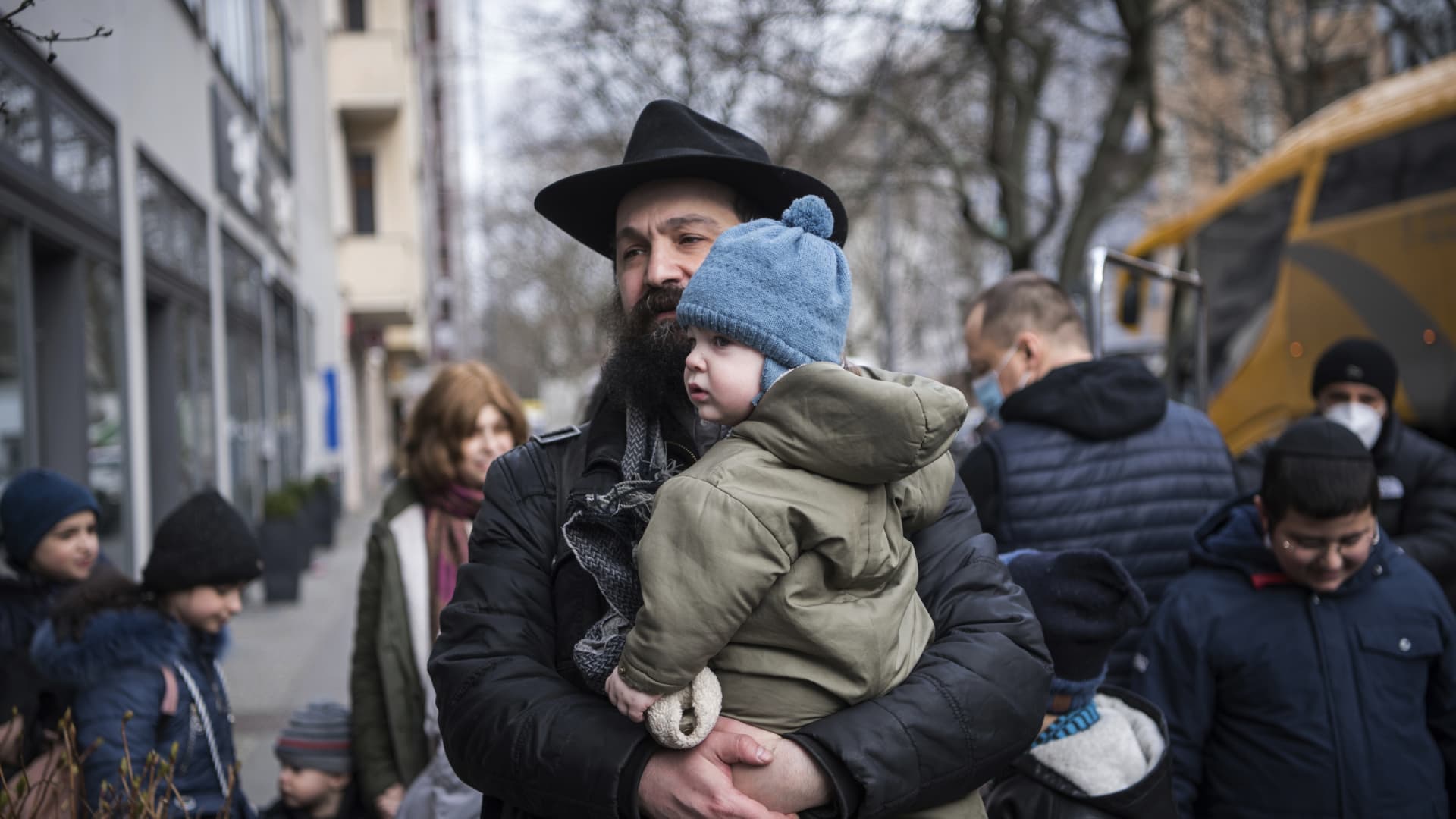 Children and their companions from an orphanage in Odesa, Ukraine, arrive at a hotel in Berlin, Friday, March 4, 2022.