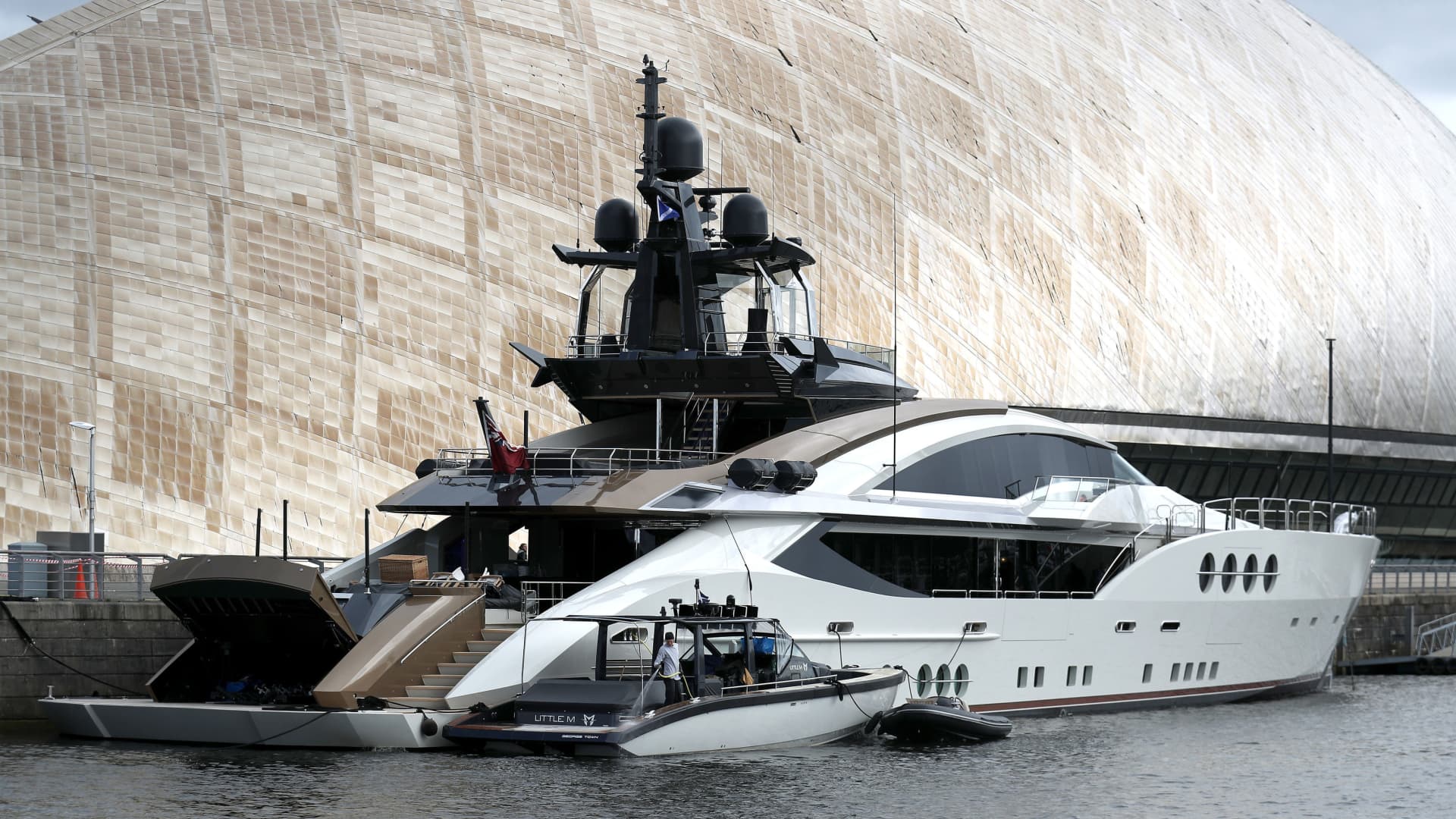 A general view of the superyacht LADY M moored next to the Glasgow Science centre on the River Clyde in Glasgow.
