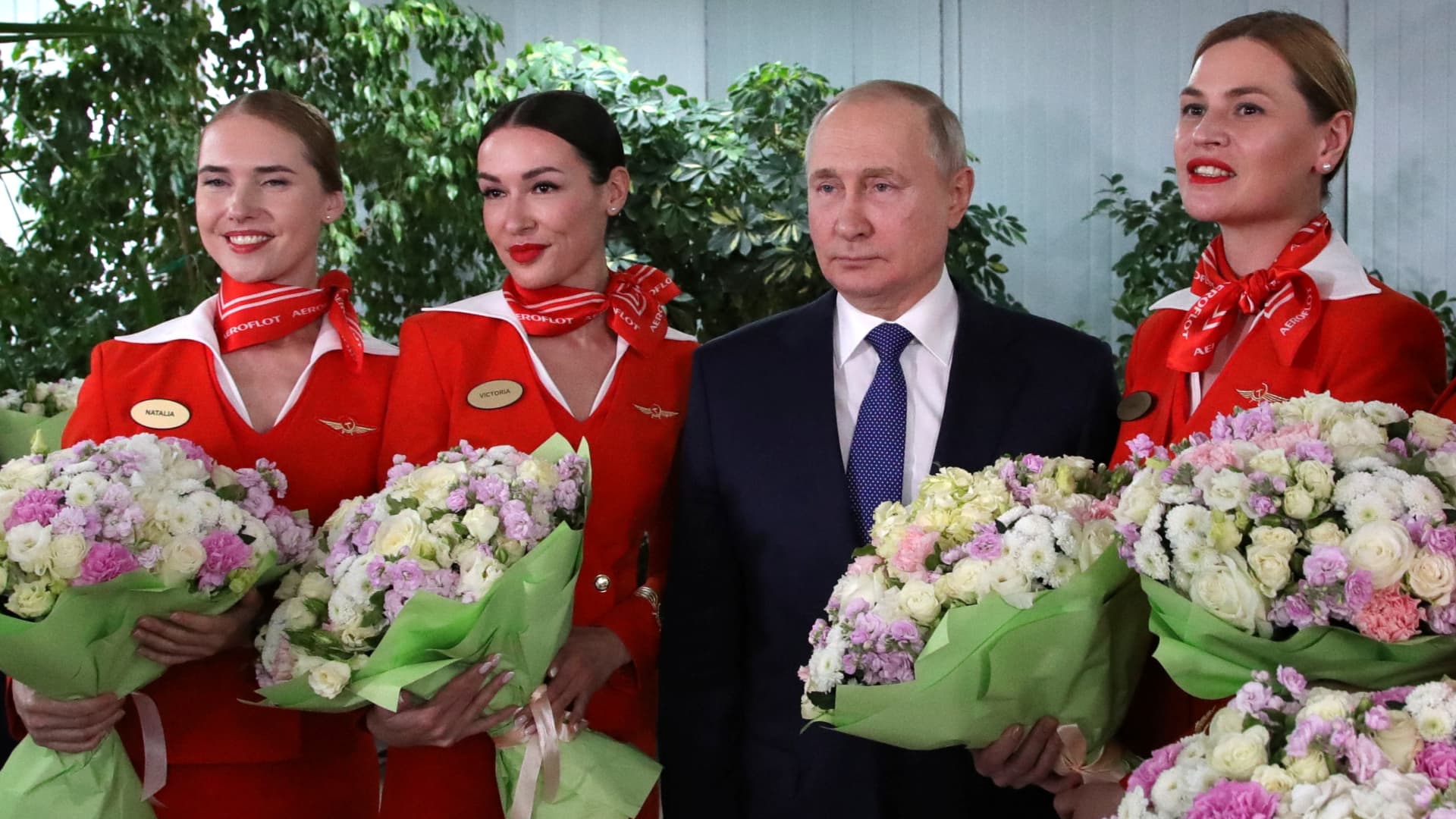 Russian President Vladimir Putin congratulates women on the upcoming International Women's Day as he meets with flight personnel, students and employees of the Aeroflot Aviation School in the suburbs of Moscow. March 5, 2022.