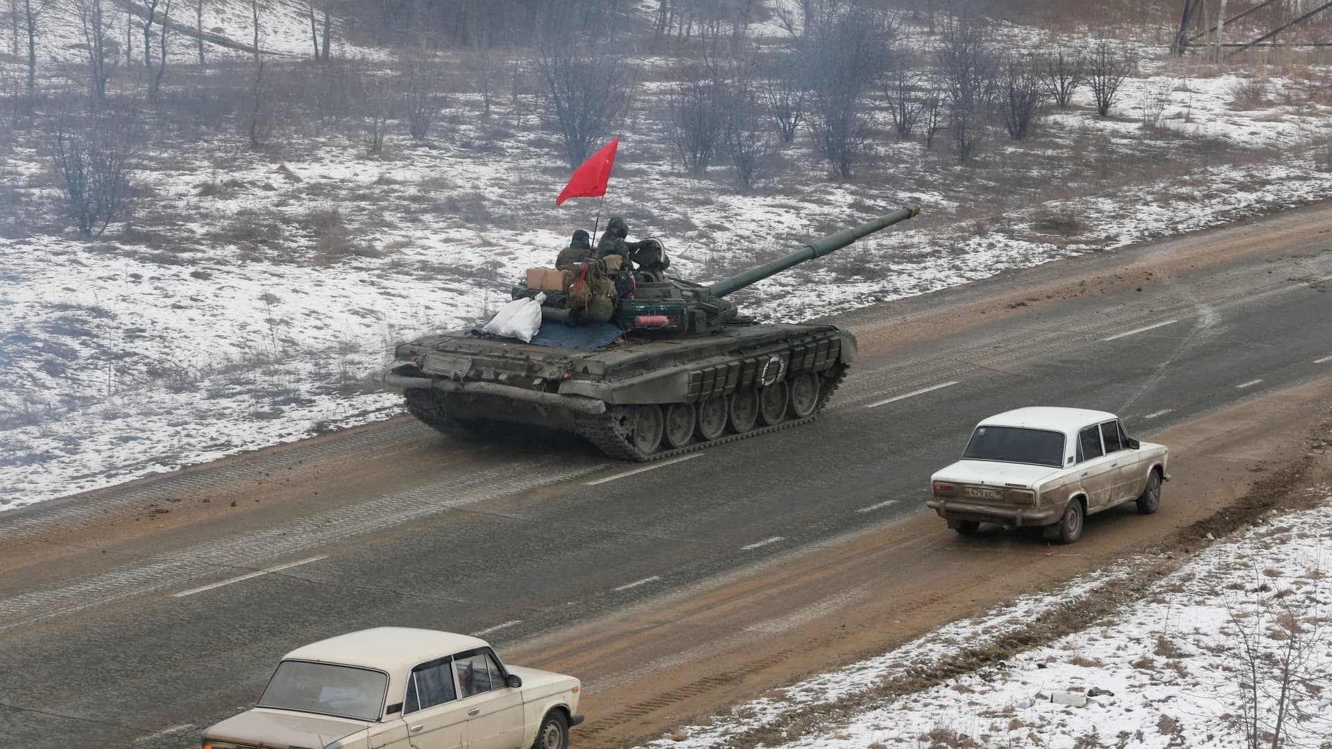 Service members of pro-Russian troops in uniforms without insignia drive a tank during Ukraine-Russia conflict on the outskirts of separatist-controlled city of Donetsk, Ukraine March 5, 2022.