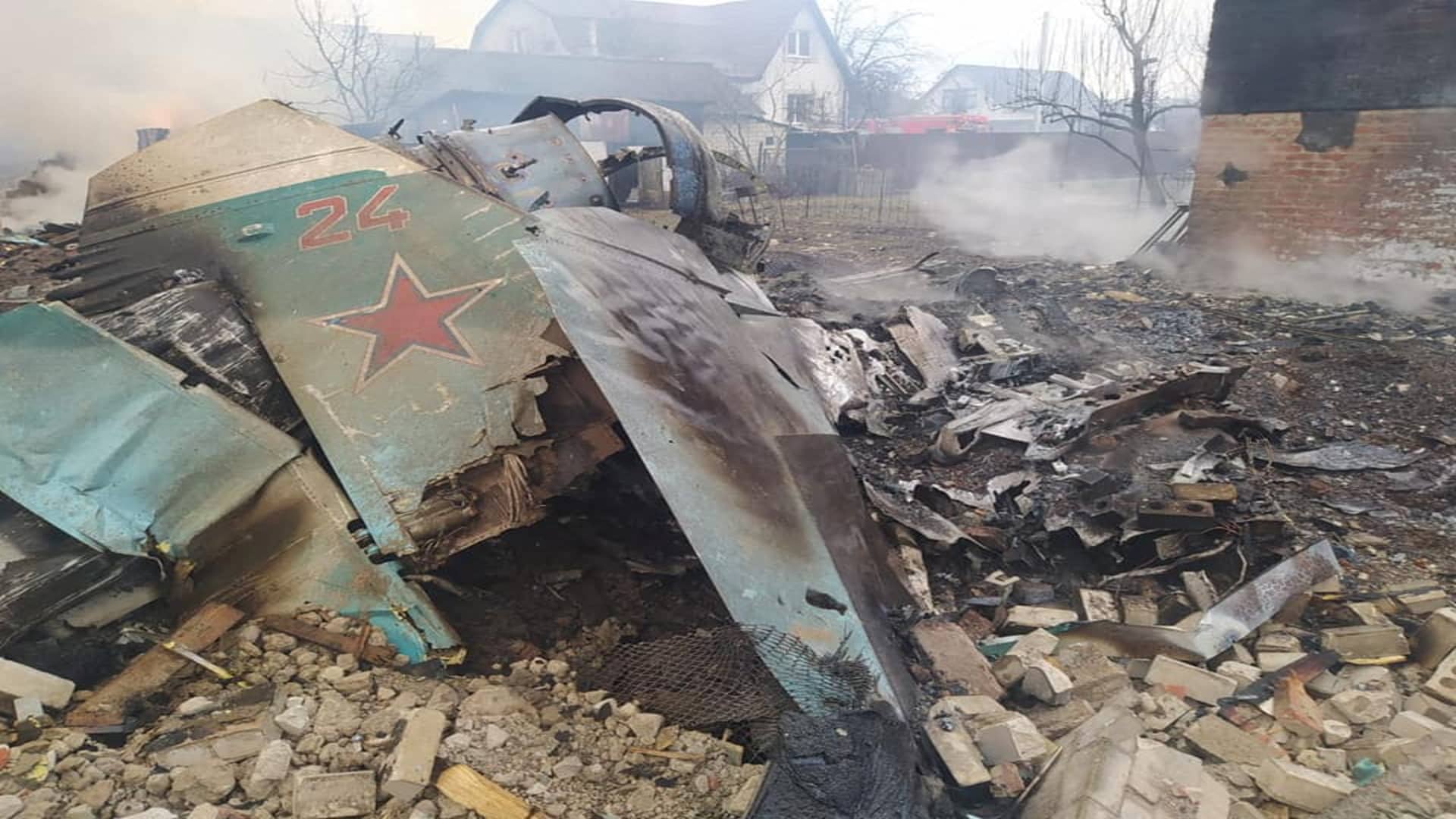 Remains of the Russian fighting aircraft are seen at a residential area, amid the Russian invasion of Ukraine, in Chernihiv, Ukraine, in this handout picture released March 5, 2022. 