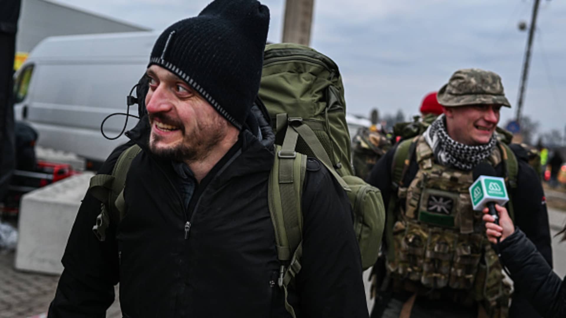 Mike and Alex from the United Kingdom who served in Afghanistan as paramedics arrive at the Polish Ukrainian border crossing looking for transport to Lviv to join the fight against the Russian invasion on March 06, 2022 in Medyka, Poland.
