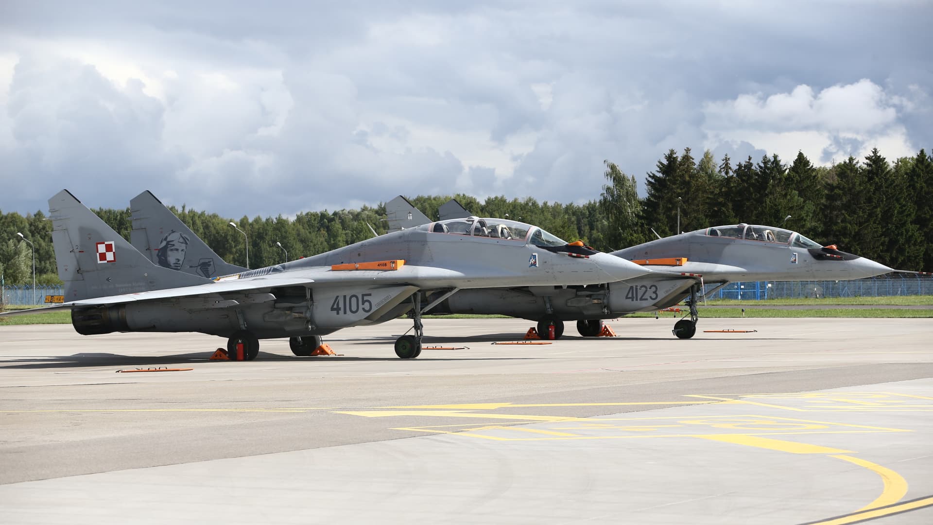 Two Polish MiG-29s sit at an airbase in Malbork, Poland, in this file photo from August 2021.