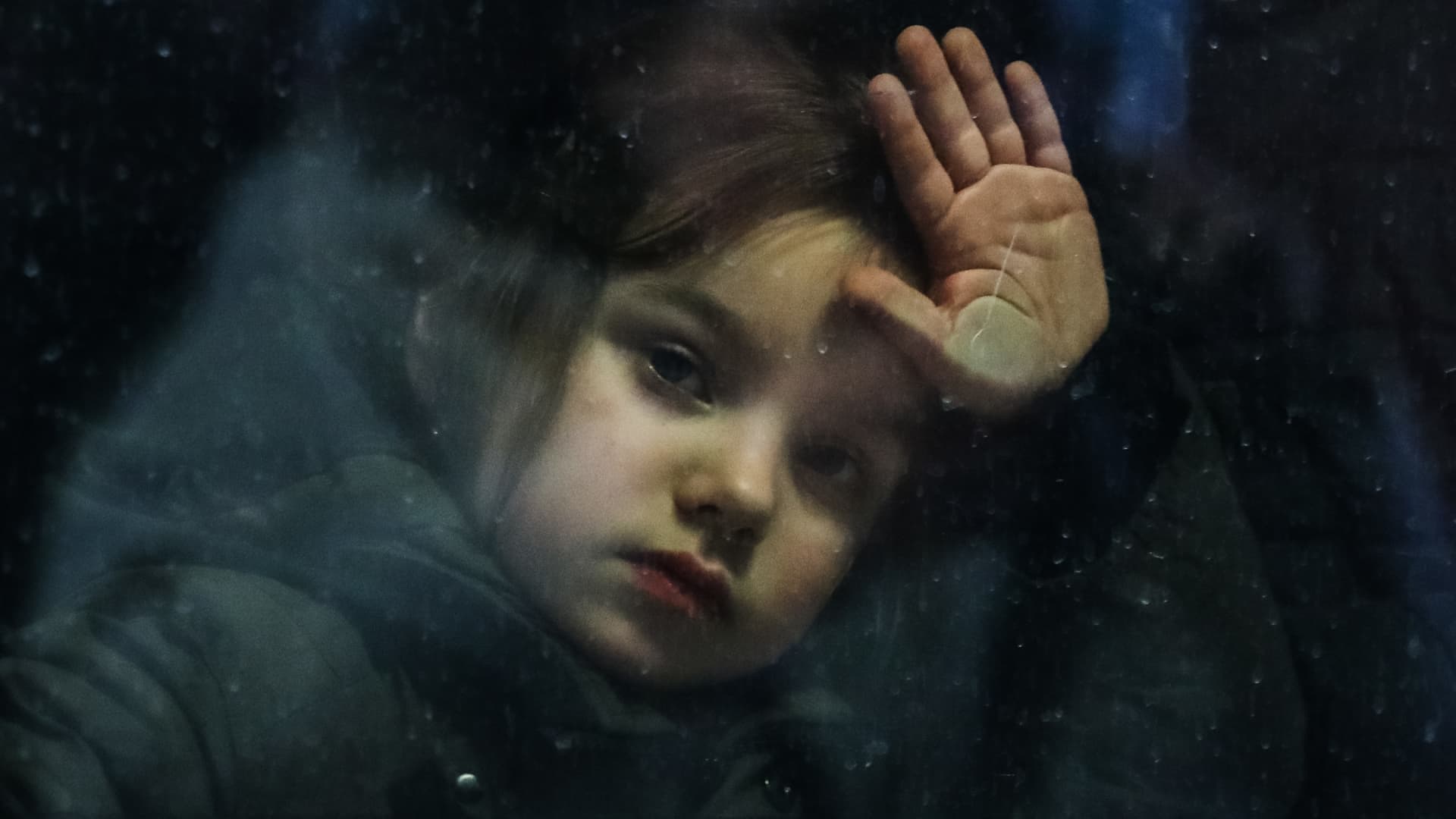 Refugee girl from Ukraine who arrived from Przemysl is seen on a train at the main railway station in Krakow, Poland on March 7, 2022.