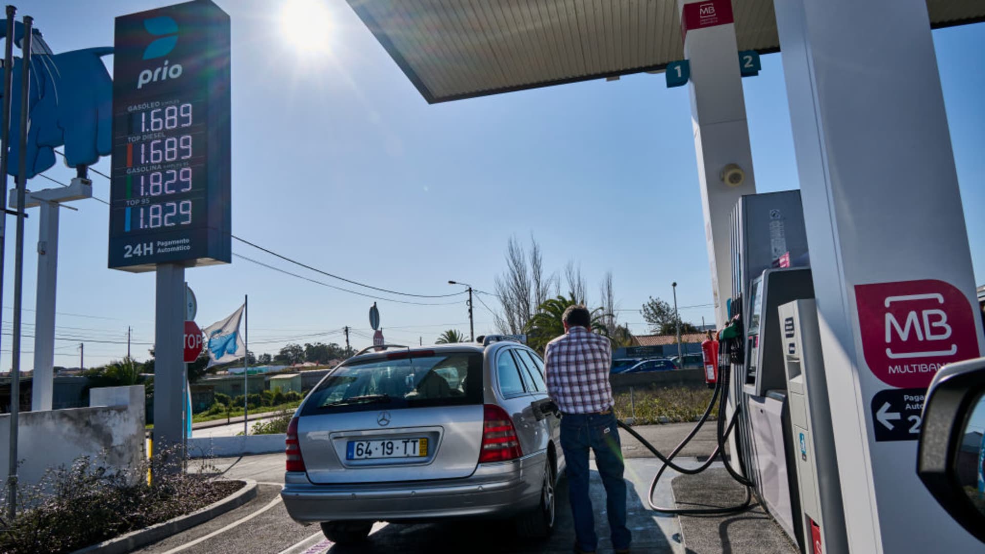 A driver fills up the tank of his car at the pump of a low-cost Prio Gas Station on the eve of an announced fuel price increase on March 06, 2022, in Portugal.