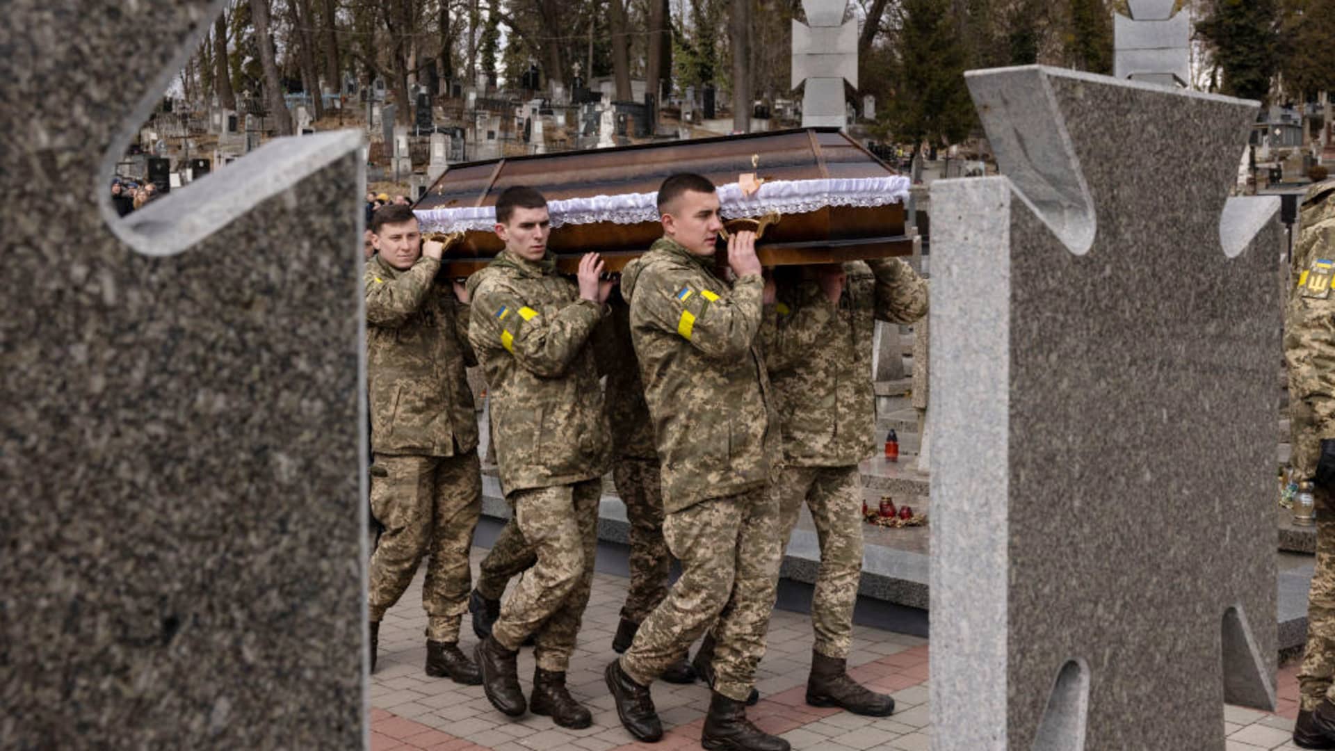 A procession takes place at Lychakiv cemetary during a joint funeral for two soldiers who died in the east of the country during recent fighting, on March 08, 2022 in Lviv, Ukraine.