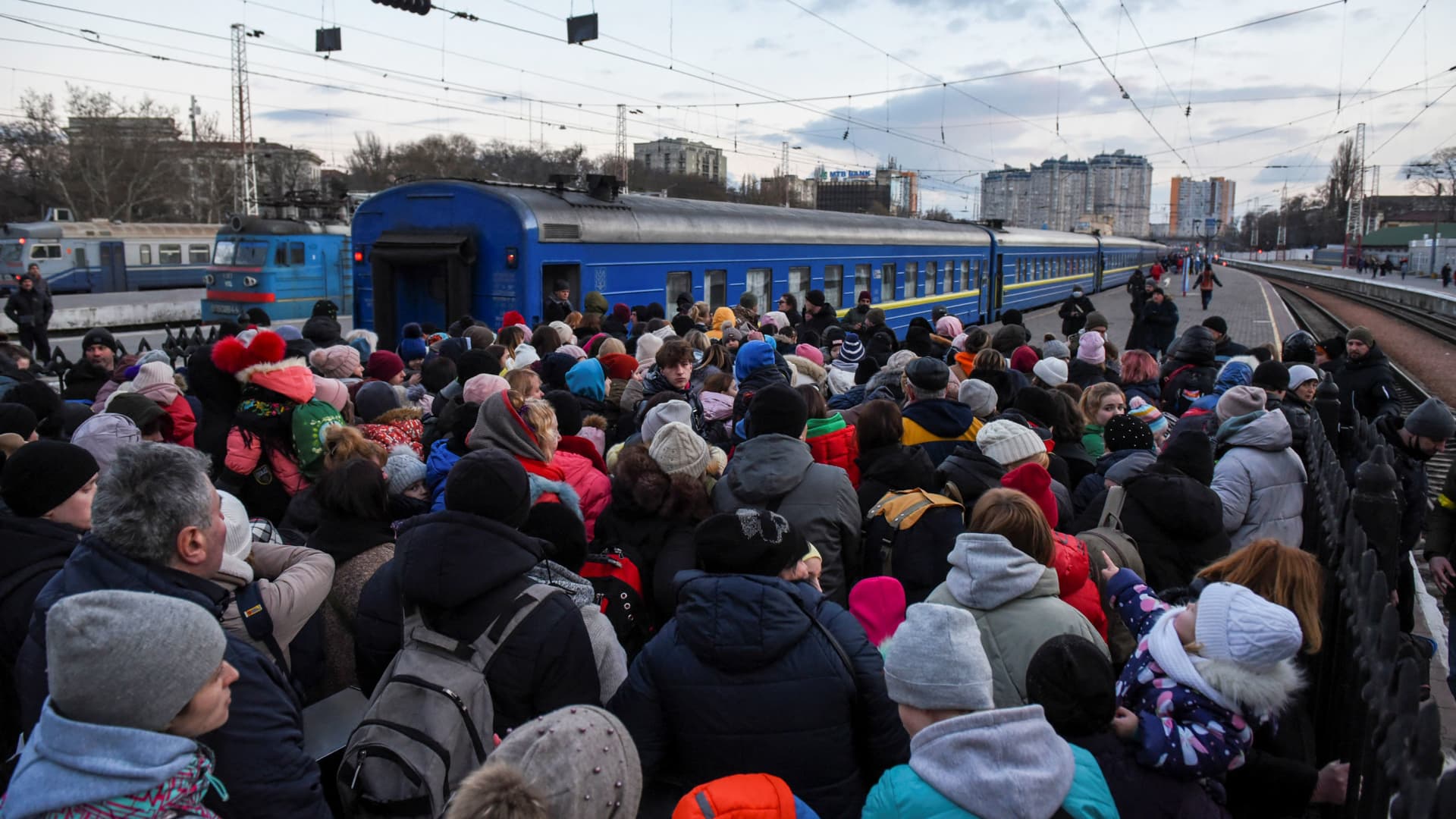Civilians board a train as they flee Russia's invasion of Ukraine, in Odessa, Ukraine, March 9, 2022.