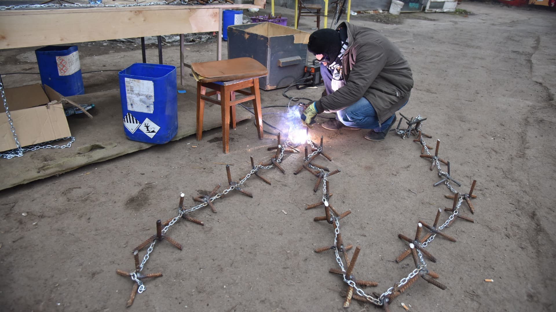 A volunteer welds an anti-vehicle obstacle during Ukraine-Russia conflict in Lviv, Ukraine March 5, 2022.