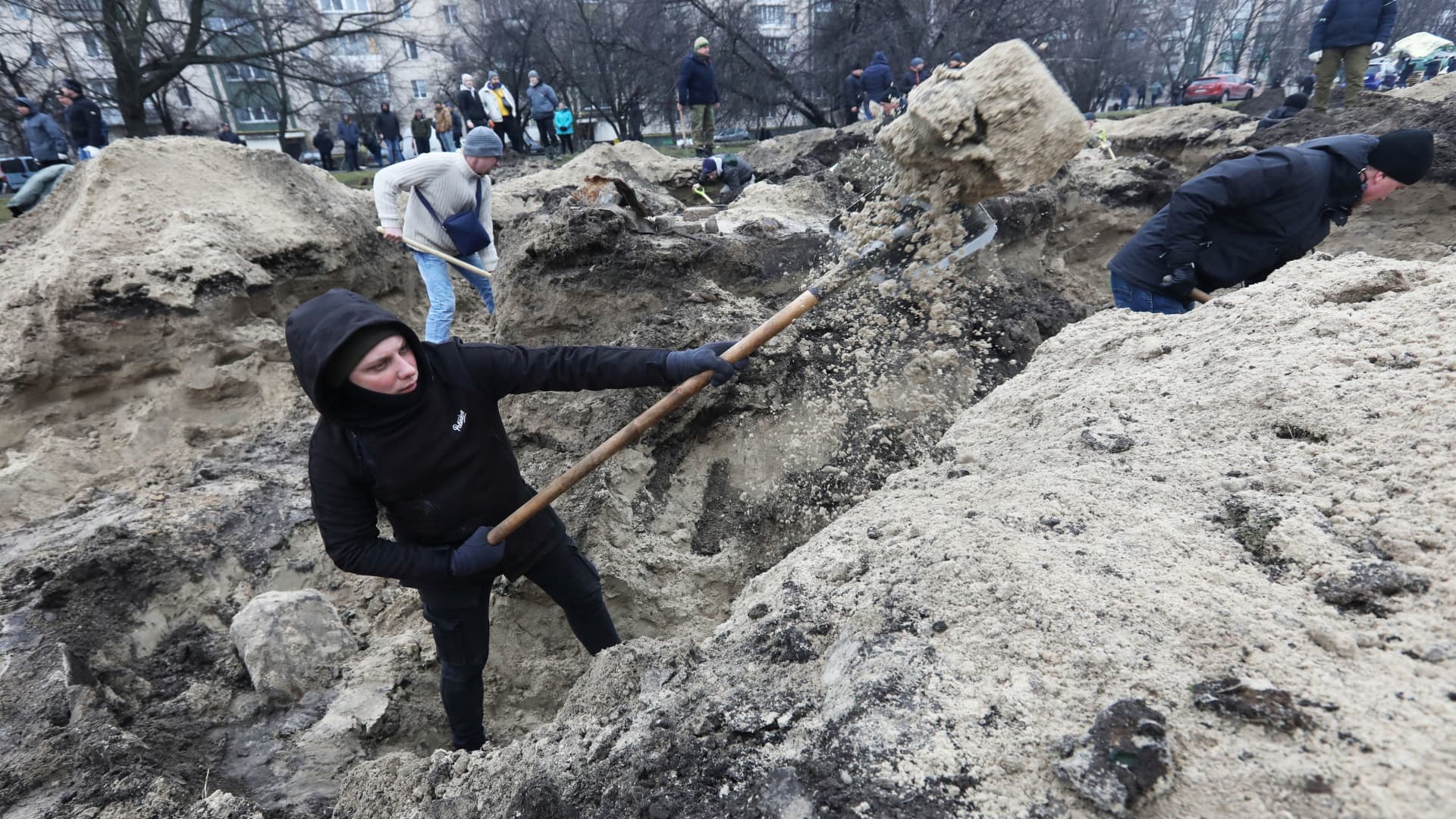 Volunteers dig trenches, as Russia's invasion of Ukraine continues, in Kyiv, Ukraine March 3, 2022.